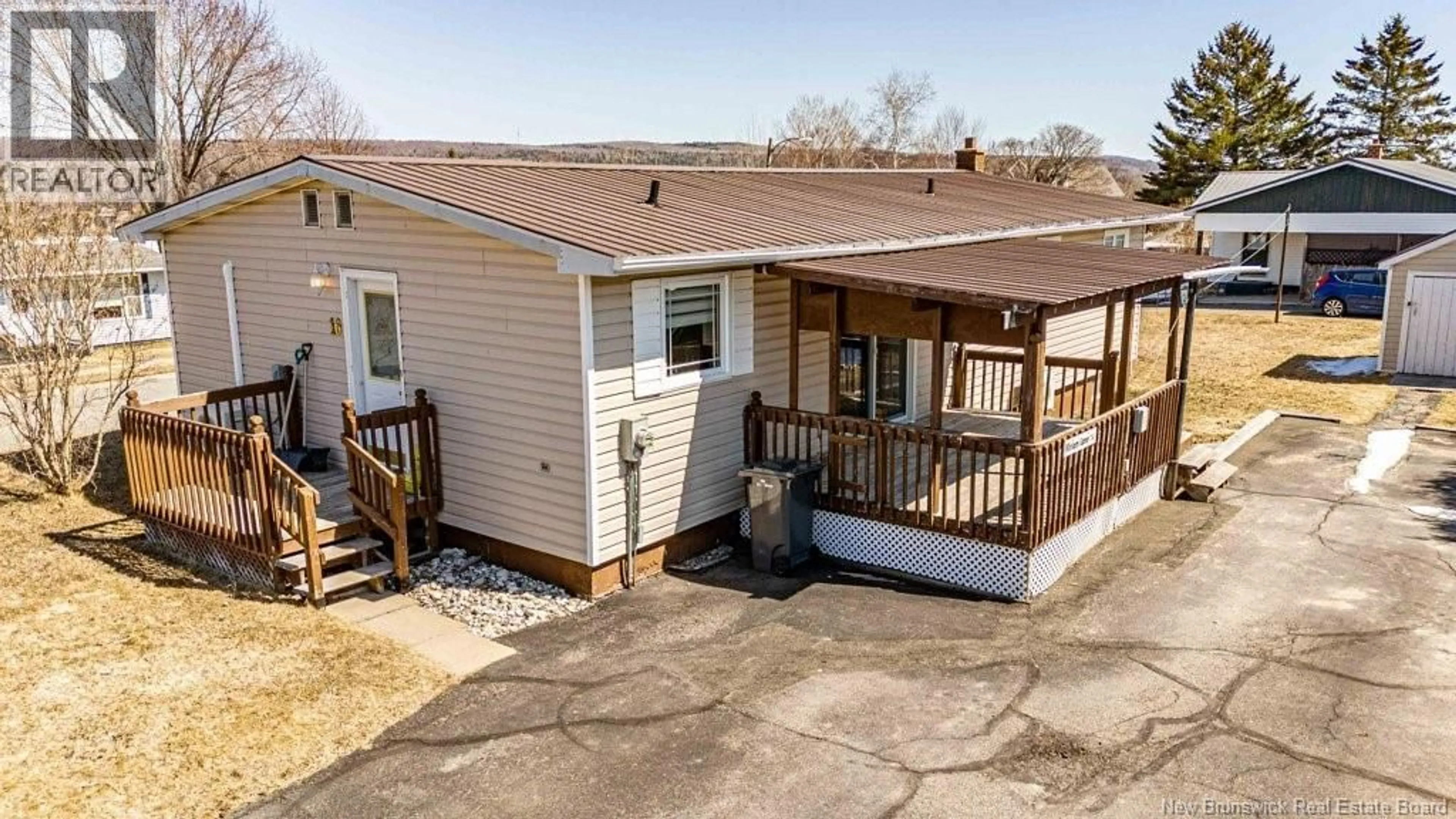 A pic from outside/outdoor area/front of a property/back of a property/a pic from drone, unknown for 16 HARDING DRIVE, Nackawic New Brunswick E6G1C4