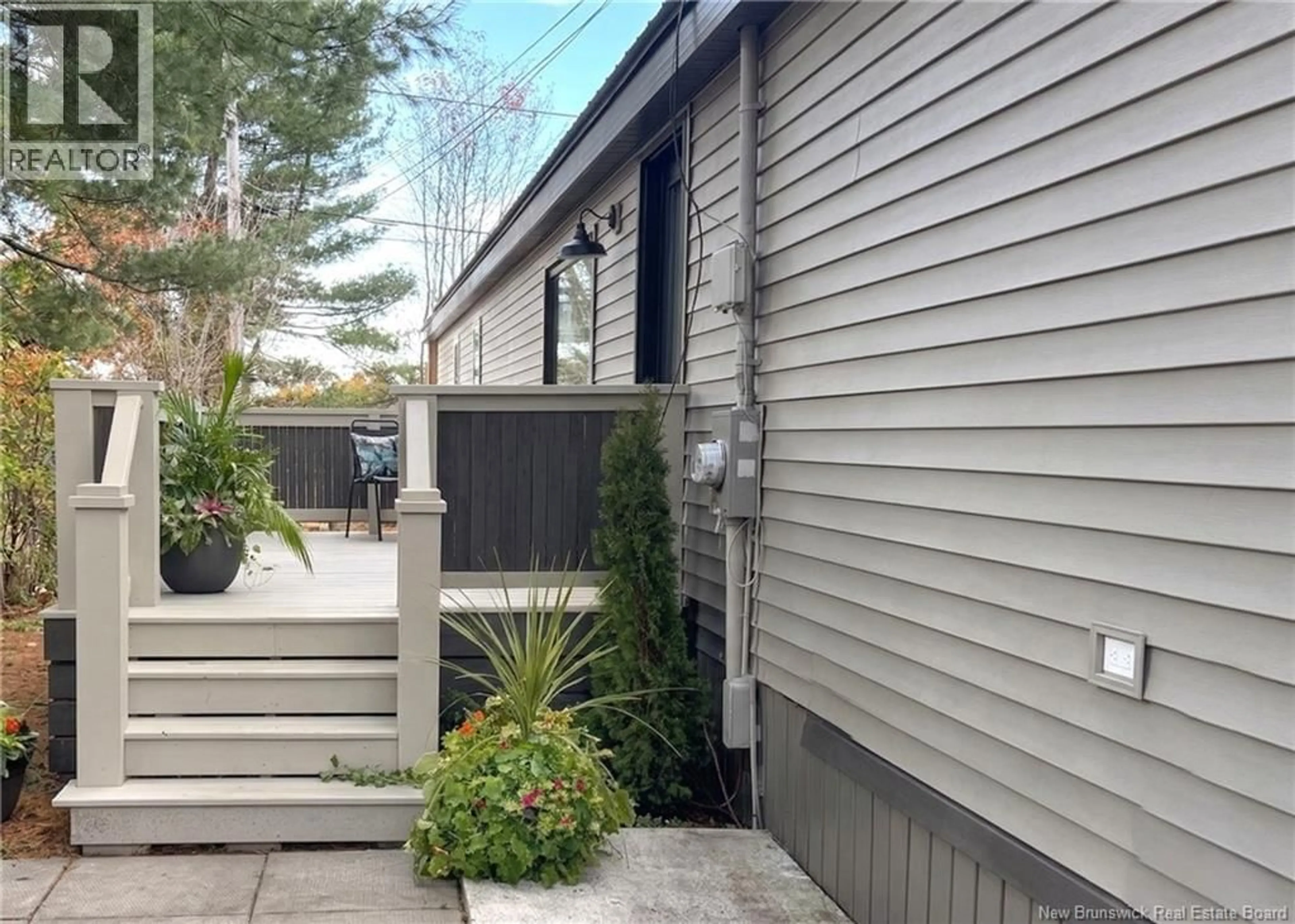 Home with vinyl exterior material, street for 8 RAWORTH AVENUE, Lakeville New Brunswick E1H1J4