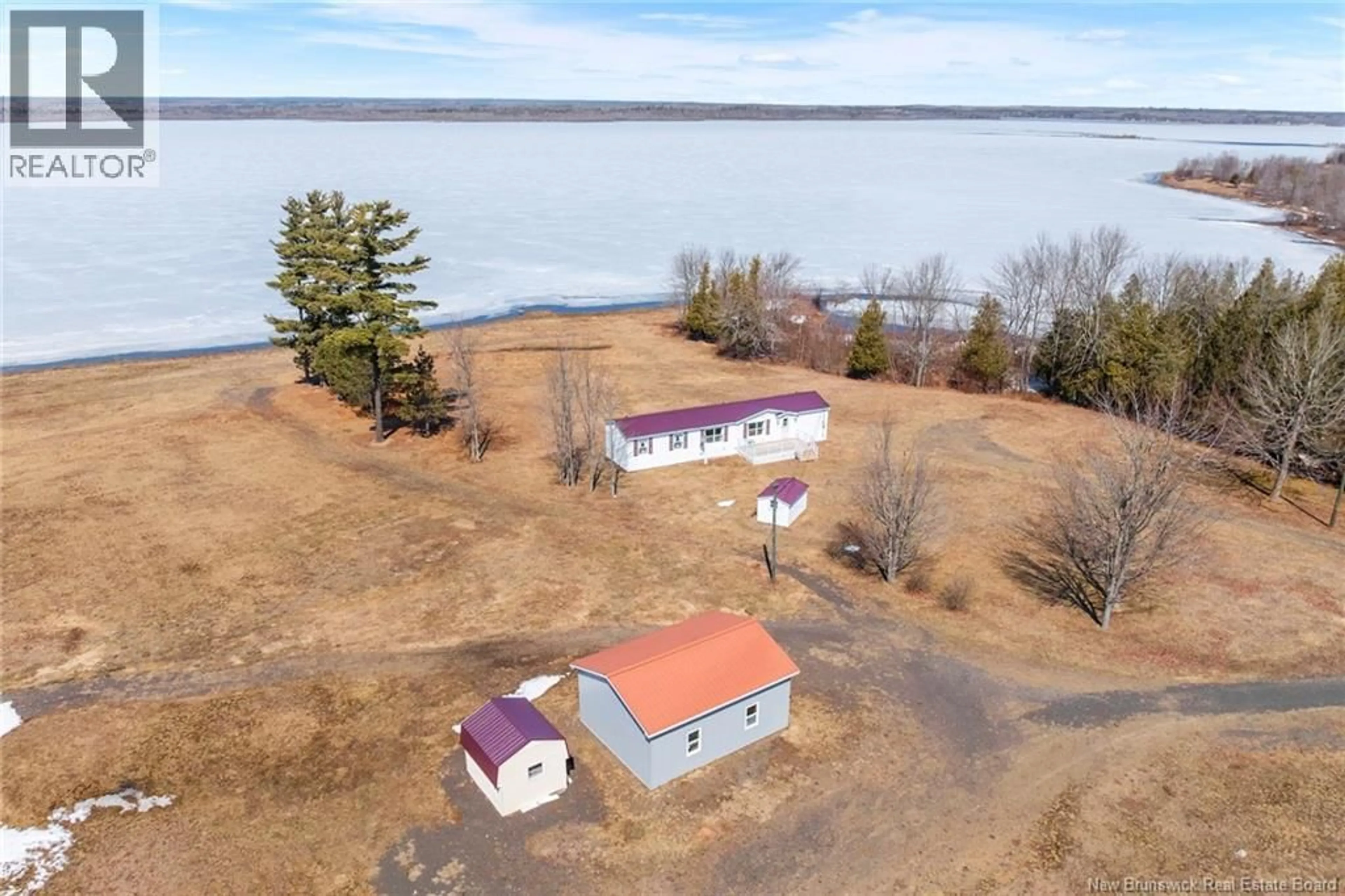 A pic from outside/outdoor area/front of a property/back of a property/a pic from drone, water/lake/river/ocean view for 388 COX POINT ROAD, Cumberland Bay New Brunswick E4A2X7