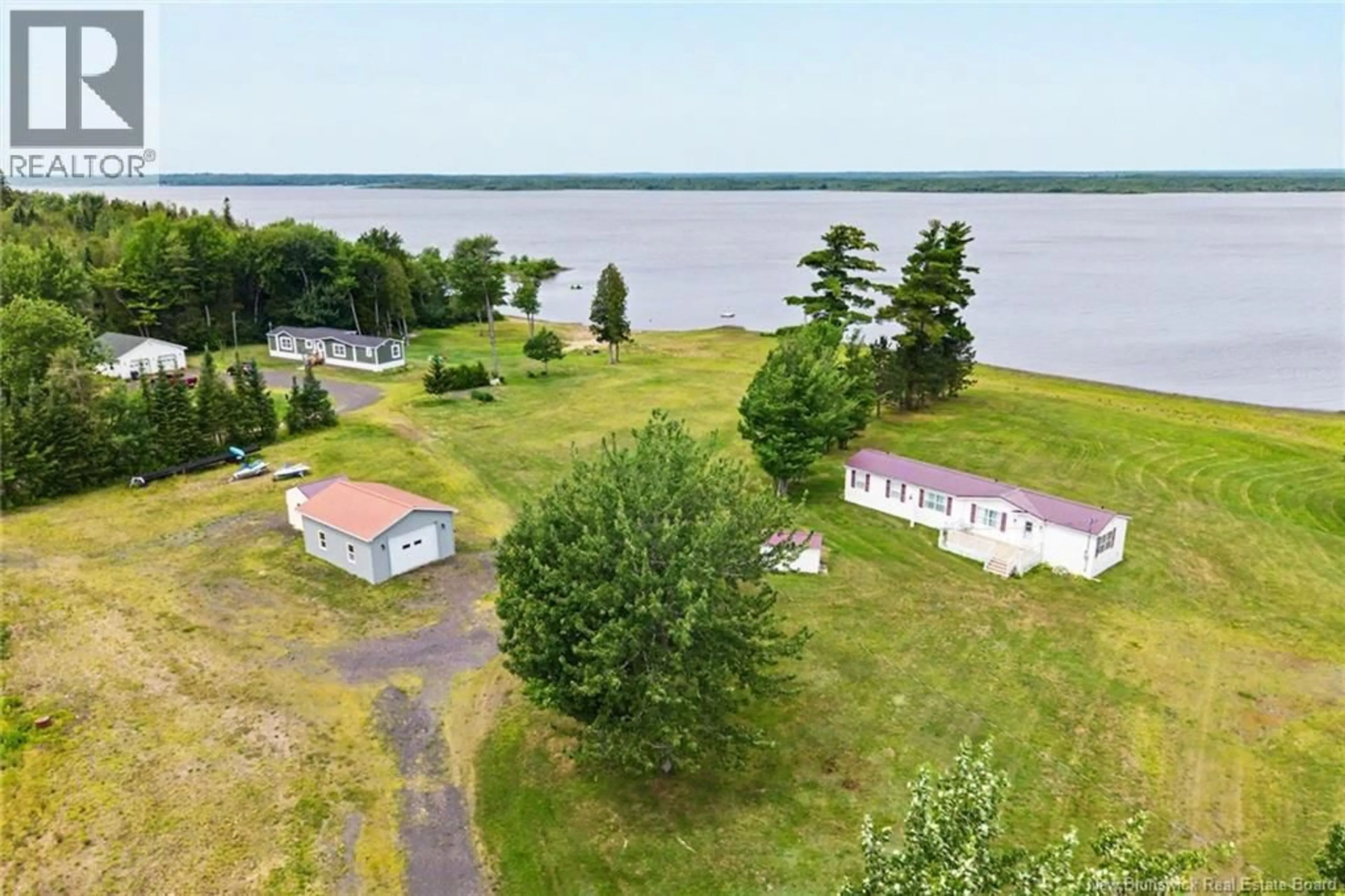 A pic from outside/outdoor area/front of a property/back of a property/a pic from drone, water/lake/river/ocean view for 388 COX POINT ROAD, Cumberland Bay New Brunswick E4A2X7