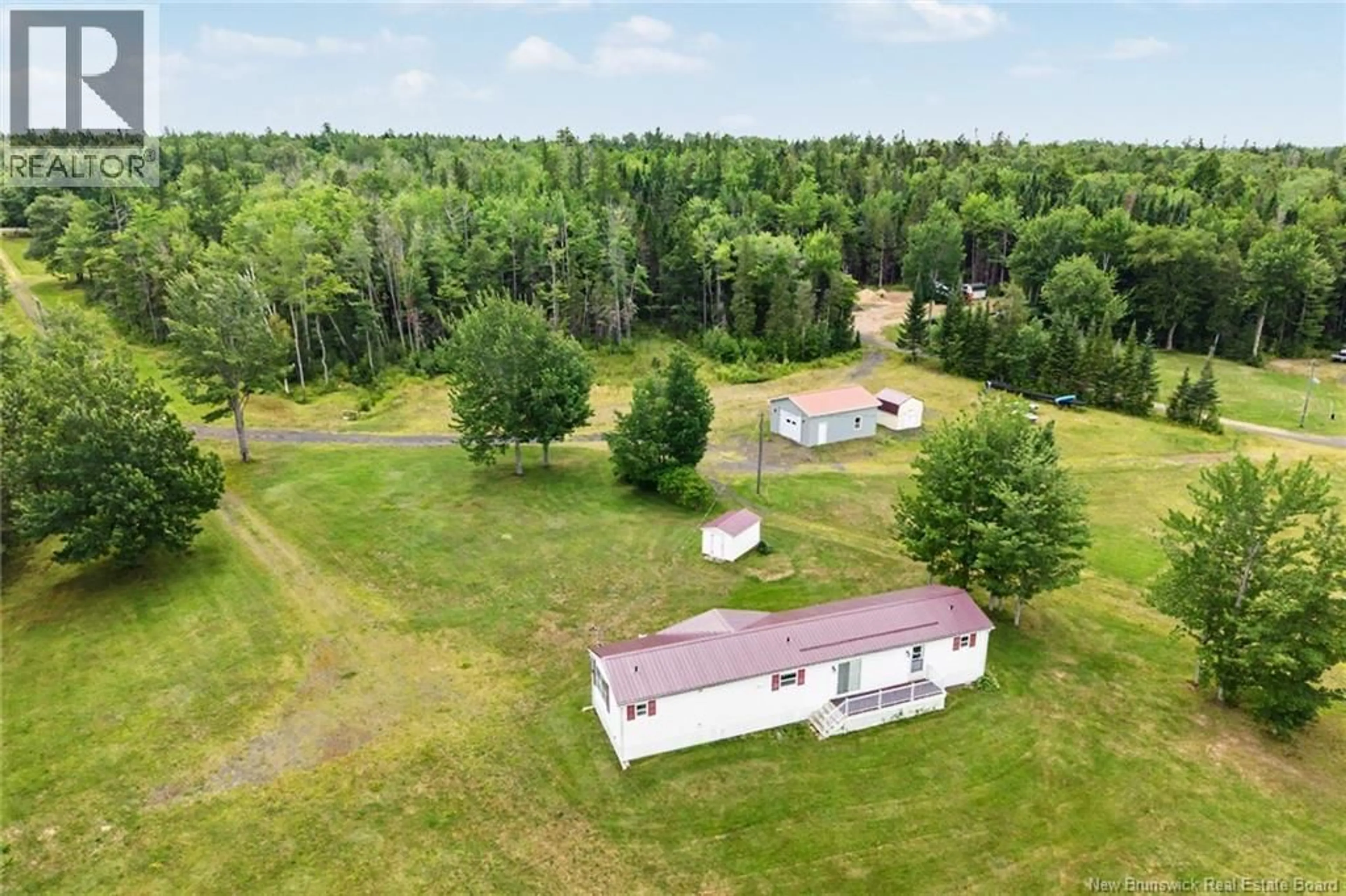 A pic from outside/outdoor area/front of a property/back of a property/a pic from drone, unknown for 388 COX POINT ROAD, Cumberland Bay New Brunswick E4A2X7
