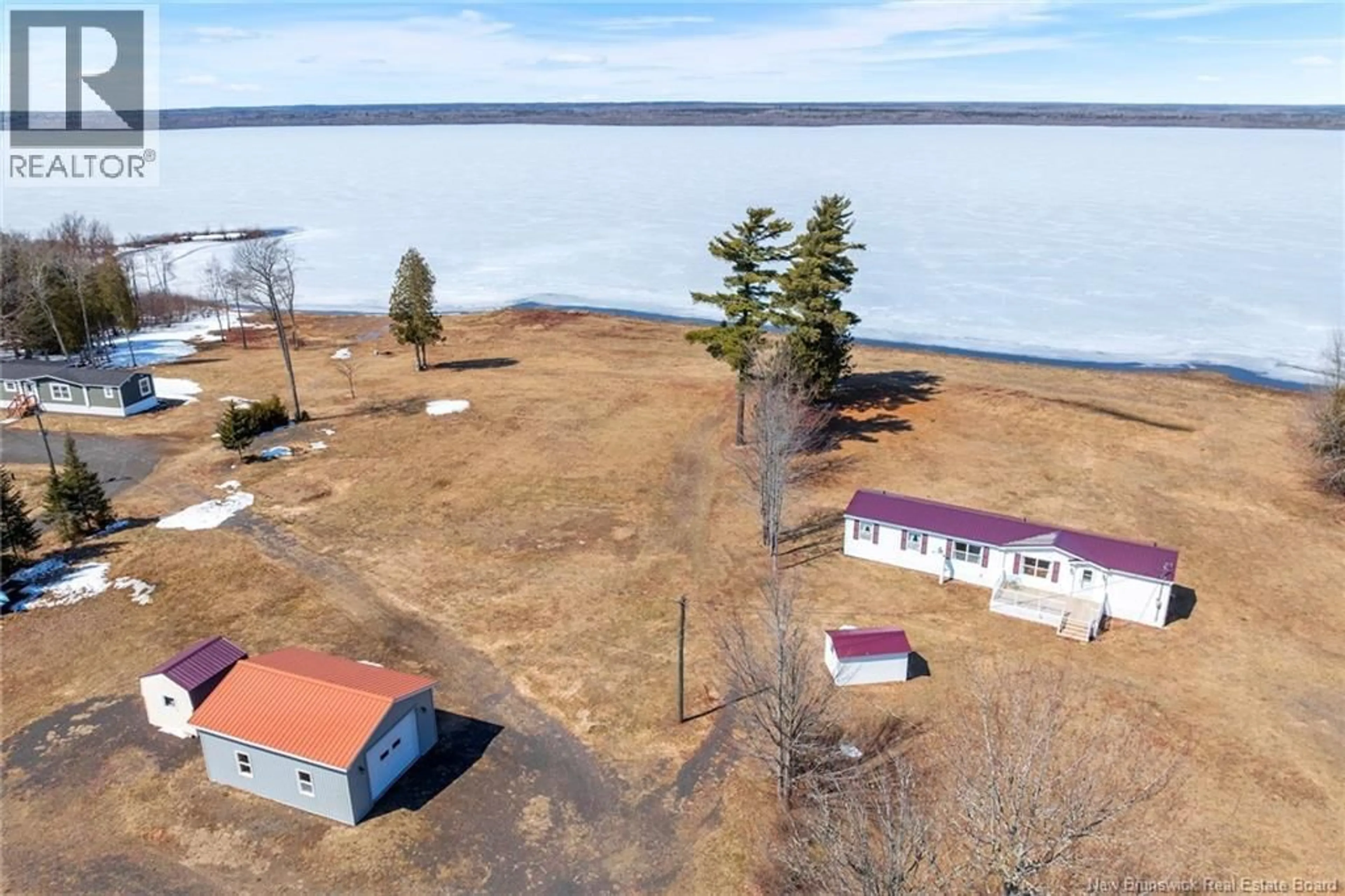 A pic from outside/outdoor area/front of a property/back of a property/a pic from drone, water/lake/river/ocean view for 388 COX POINT ROAD, Cumberland Bay New Brunswick E4A2X7