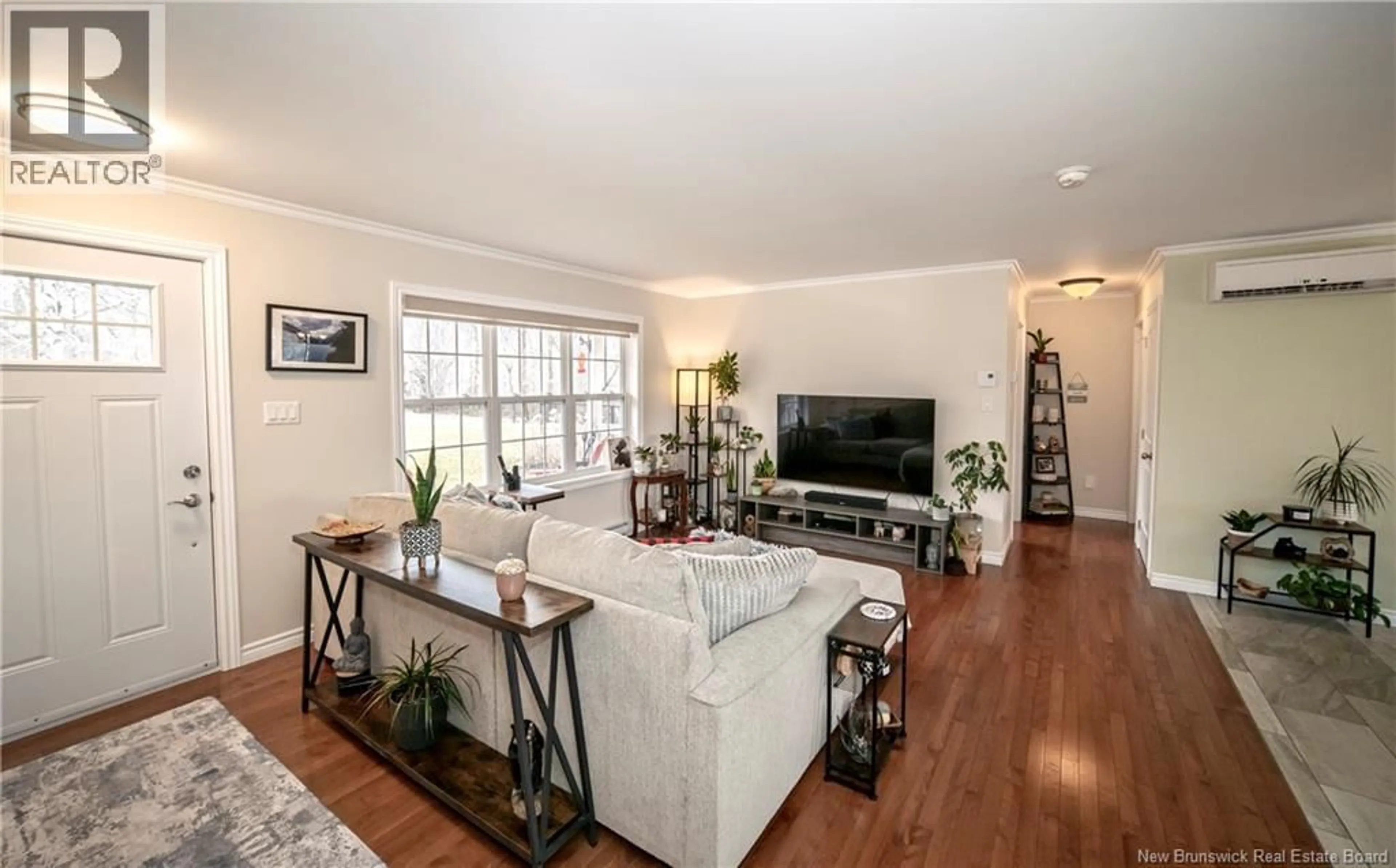 Living room with furniture, wood/laminate floor for 8 LODGE LANE, Prince William New Brunswick E6K3S9