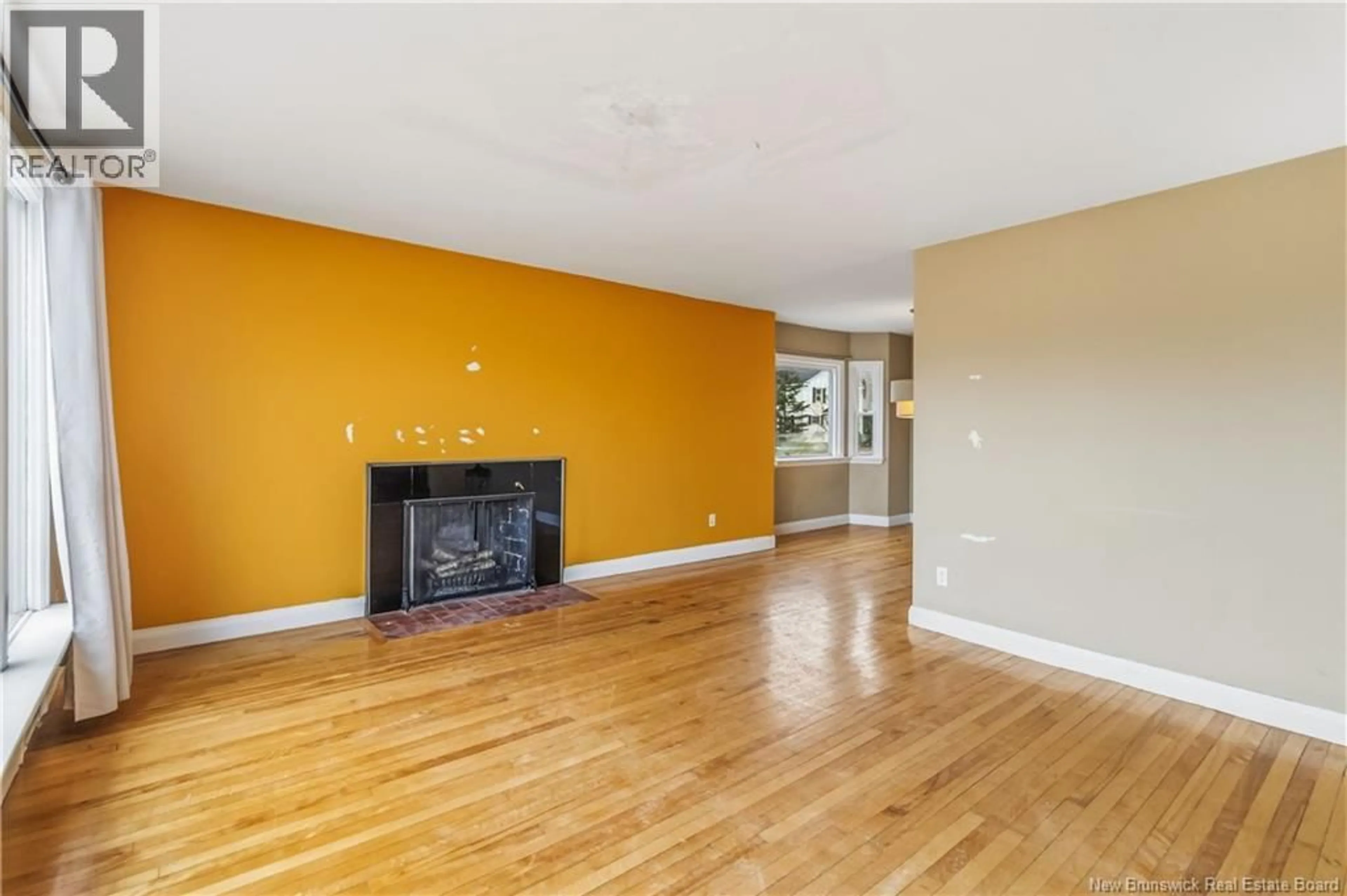 Living room with furniture, wood/laminate floor for 154 GIVAN DRIVE, Moncton New Brunswick E1E3M7