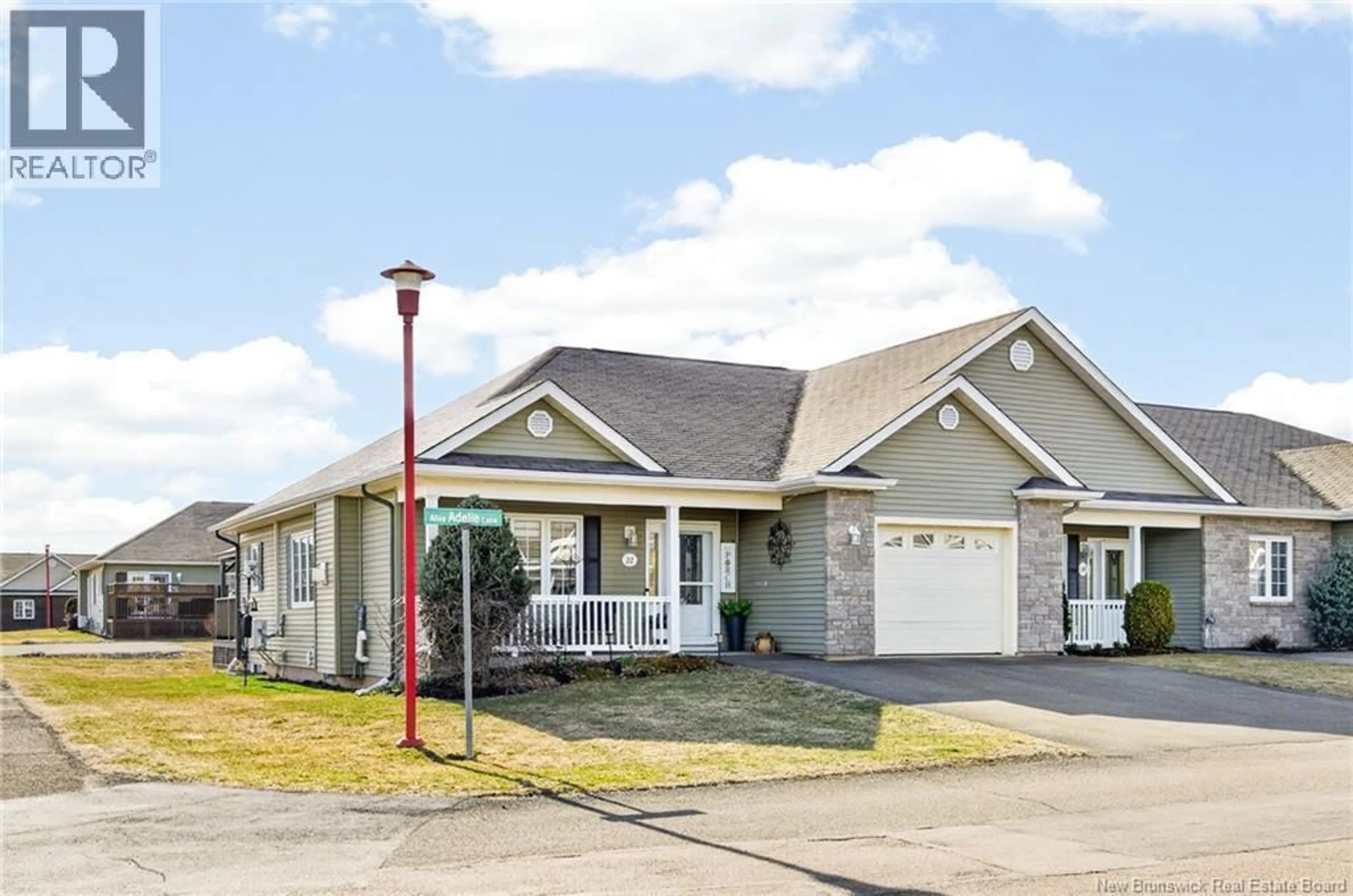 Home with vinyl exterior material, street for 22 ADELIE LANE, Moncton New Brunswick E1A0N5