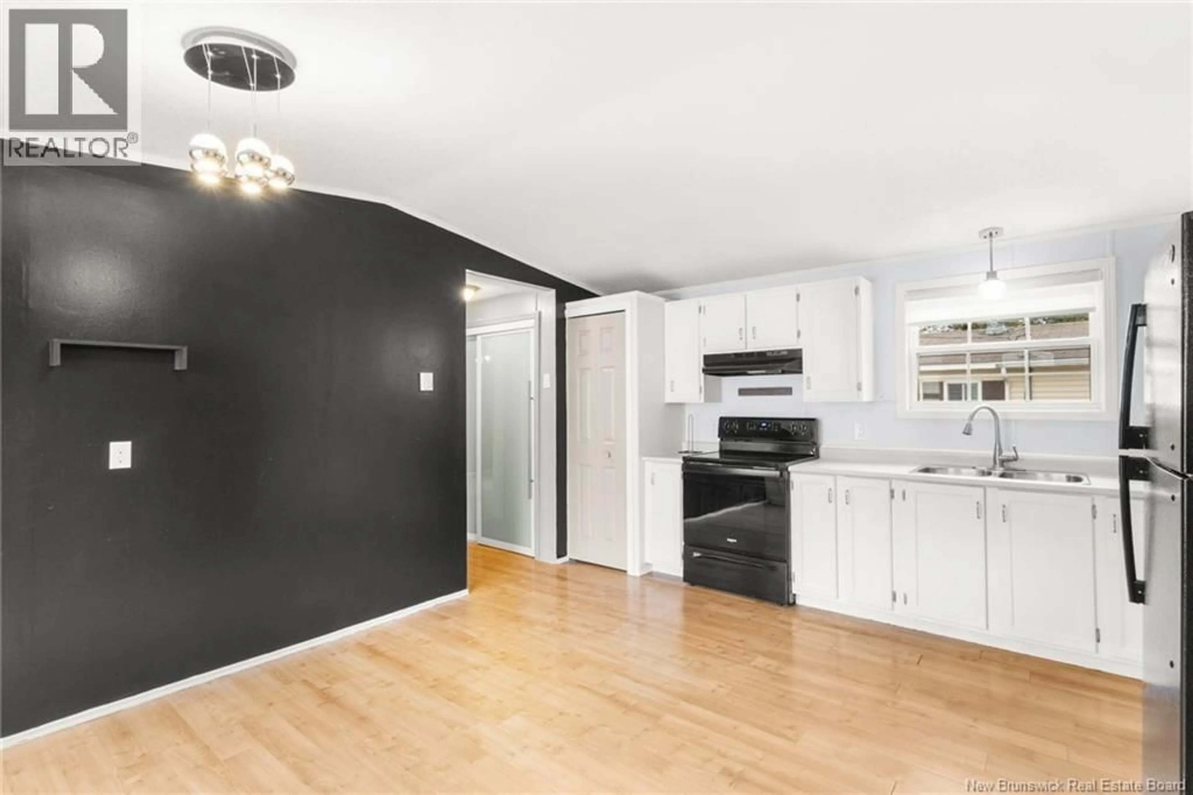 Open concept kitchen, wood/laminate floor for 111 CURRIE CRESCENT, Waasis New Brunswick E3B7H3