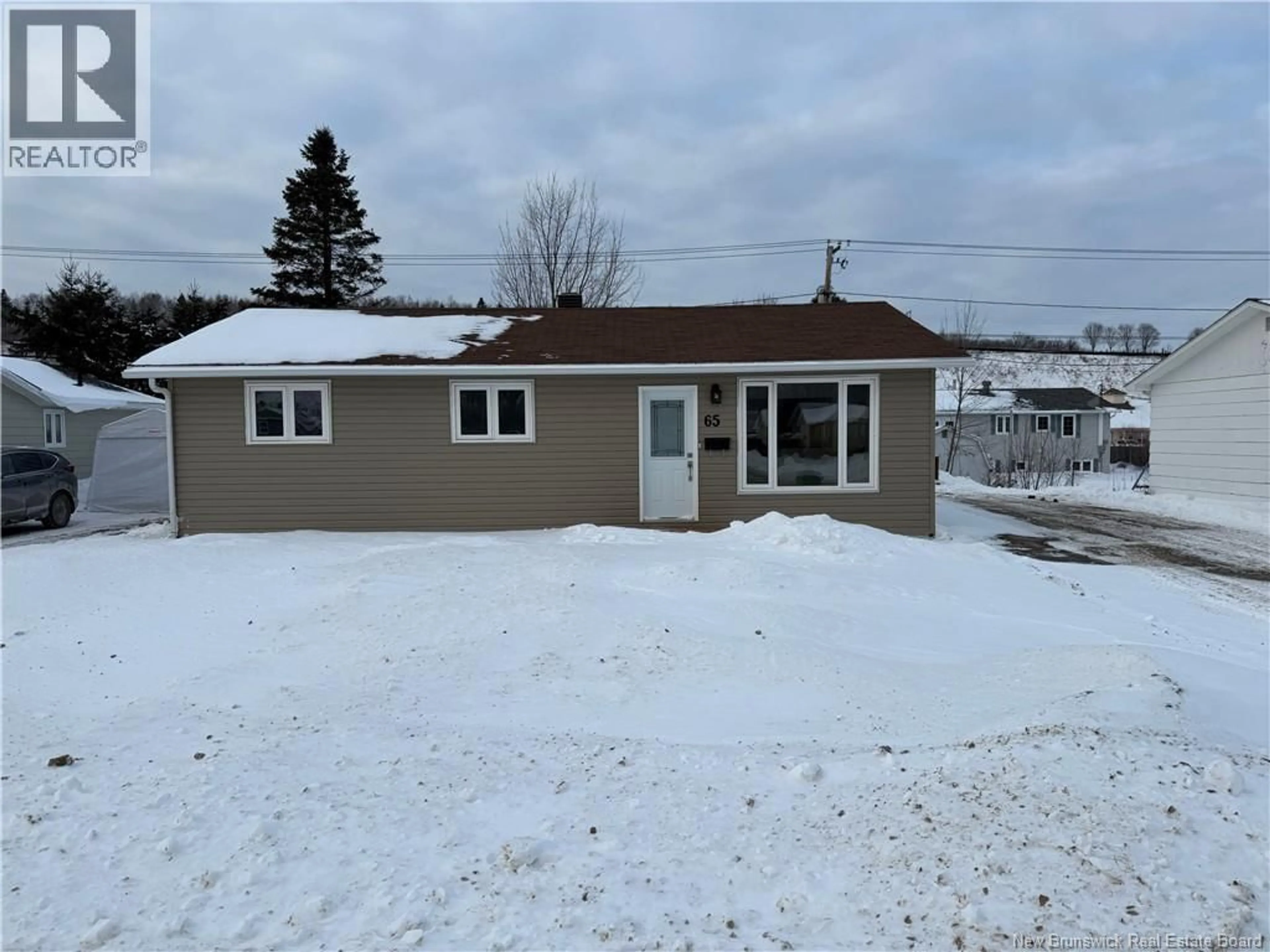 A pic from outside/outdoor area/front of a property/back of a property/a pic from drone, street for 65 SISTER GREEN, Campbellton New Brunswick E3N3Y5