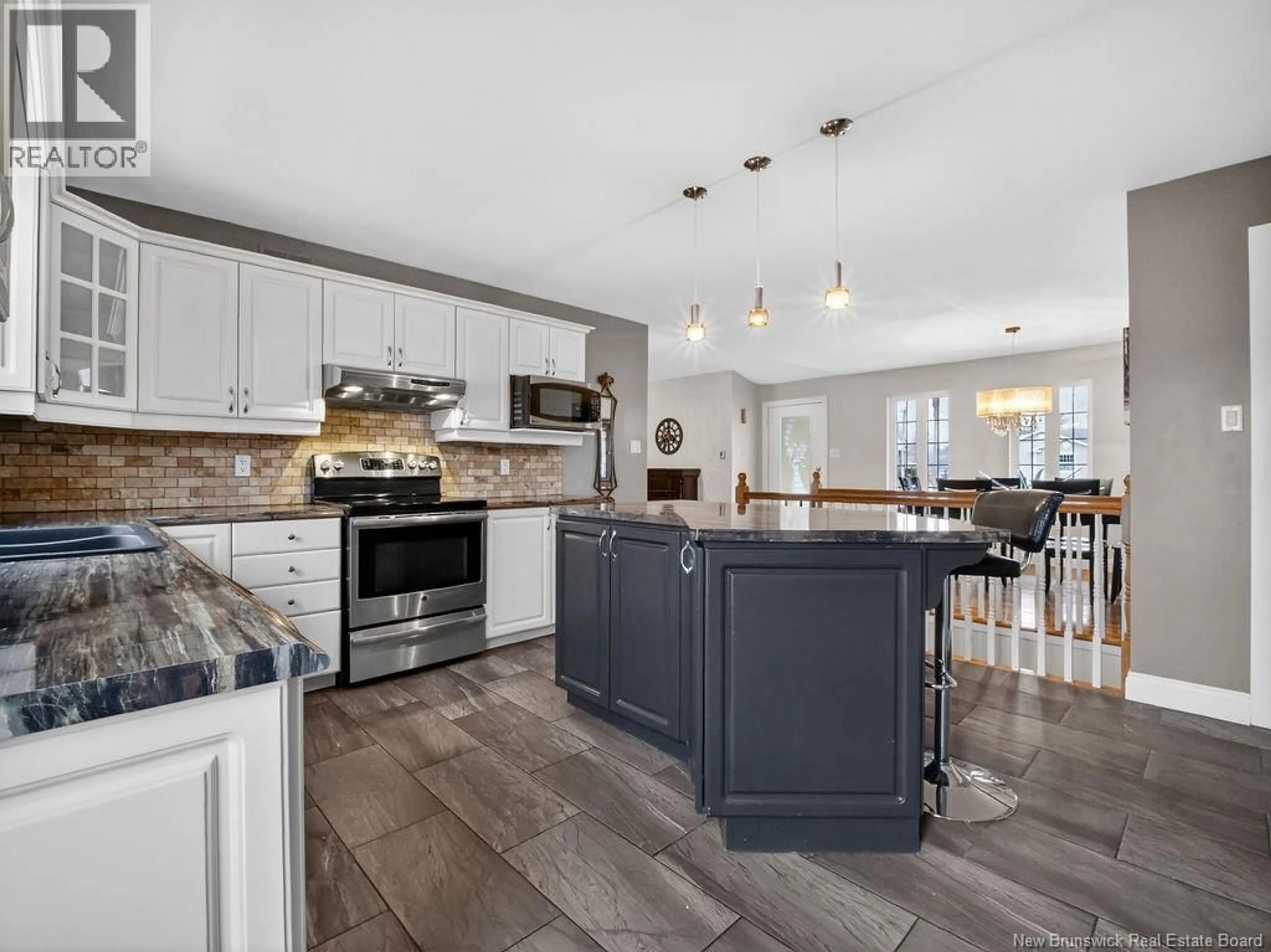 Open concept kitchen, ceramic/tile floor for 91 LEGER STREET, Saint-Antoine New Brunswick E4V1J6