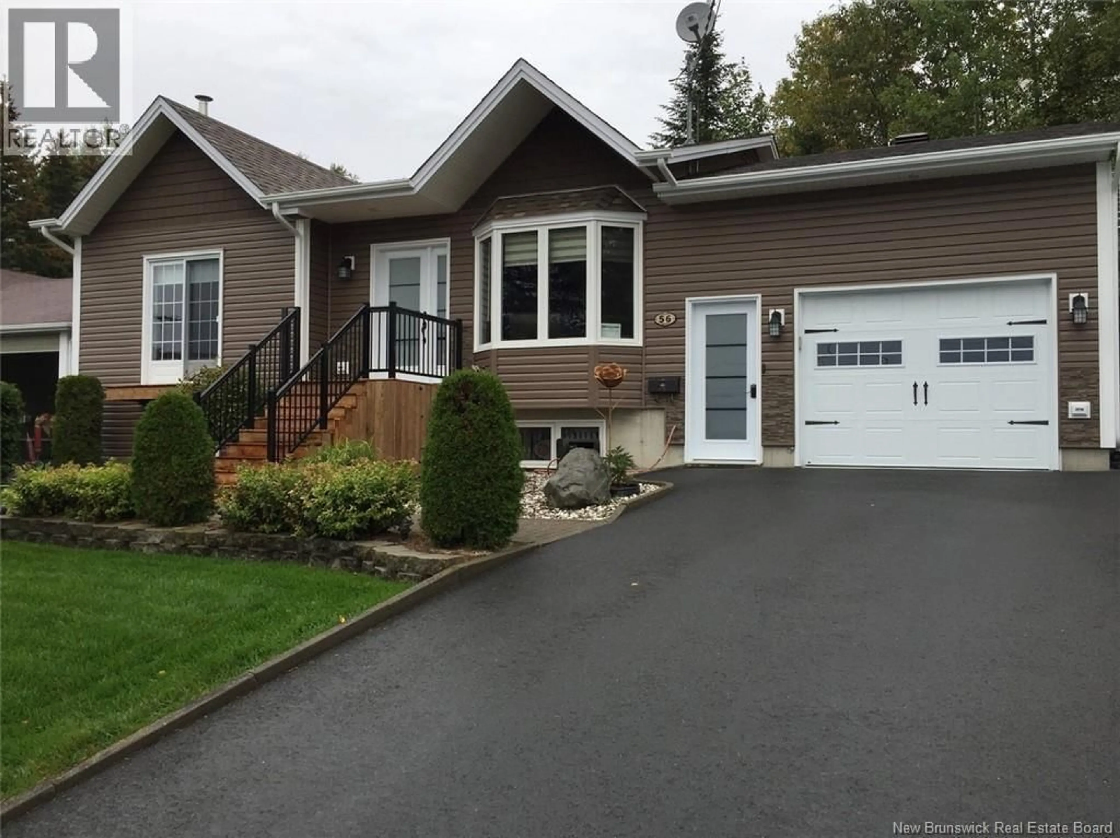Home with vinyl exterior material, street for 56 DES GOUVERNEURS STREET, Edmundston New Brunswick E3V4H5