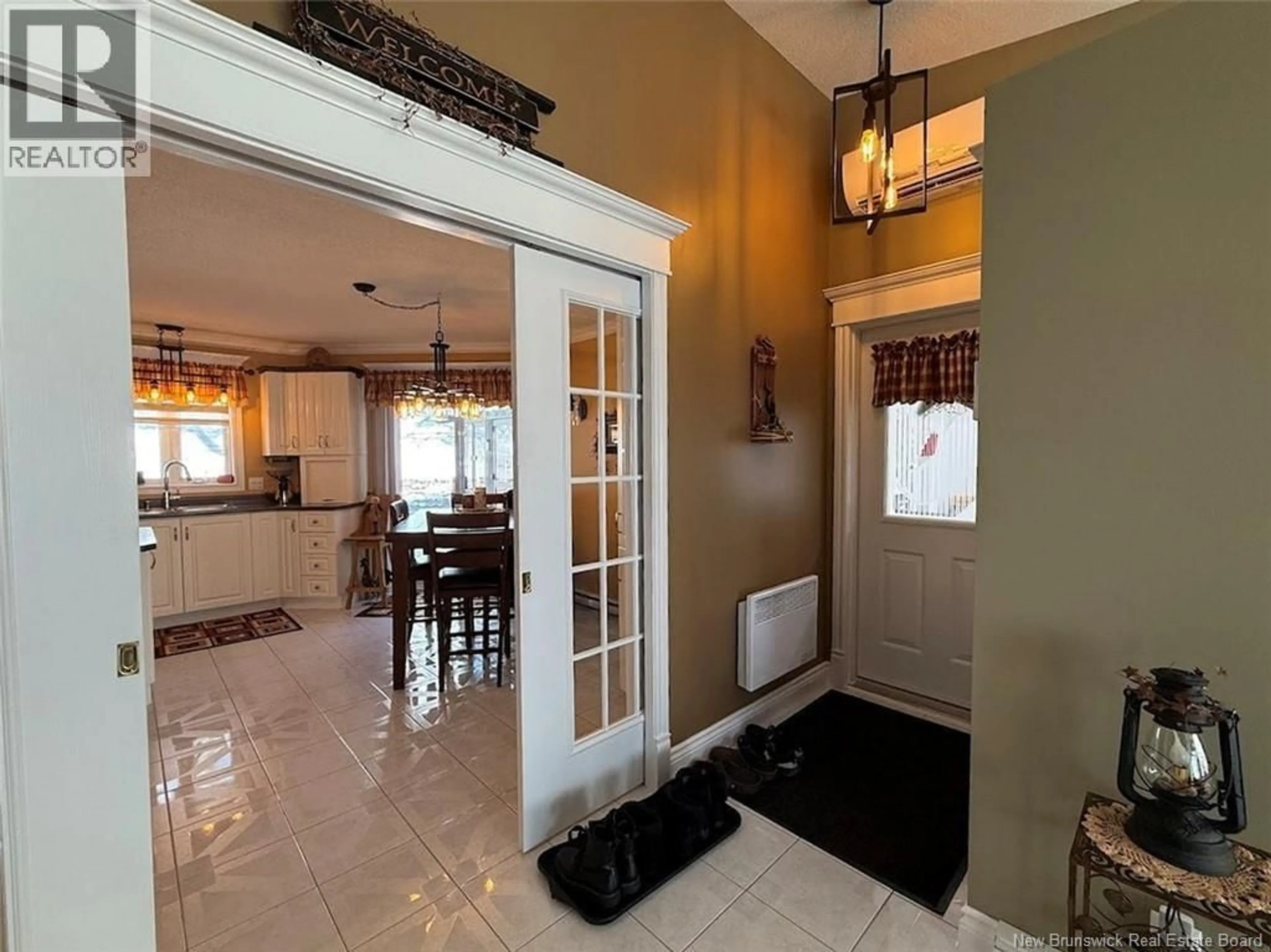 Indoor entryway for 56 DES GOUVERNEURS STREET, Edmundston New Brunswick E3V4H5