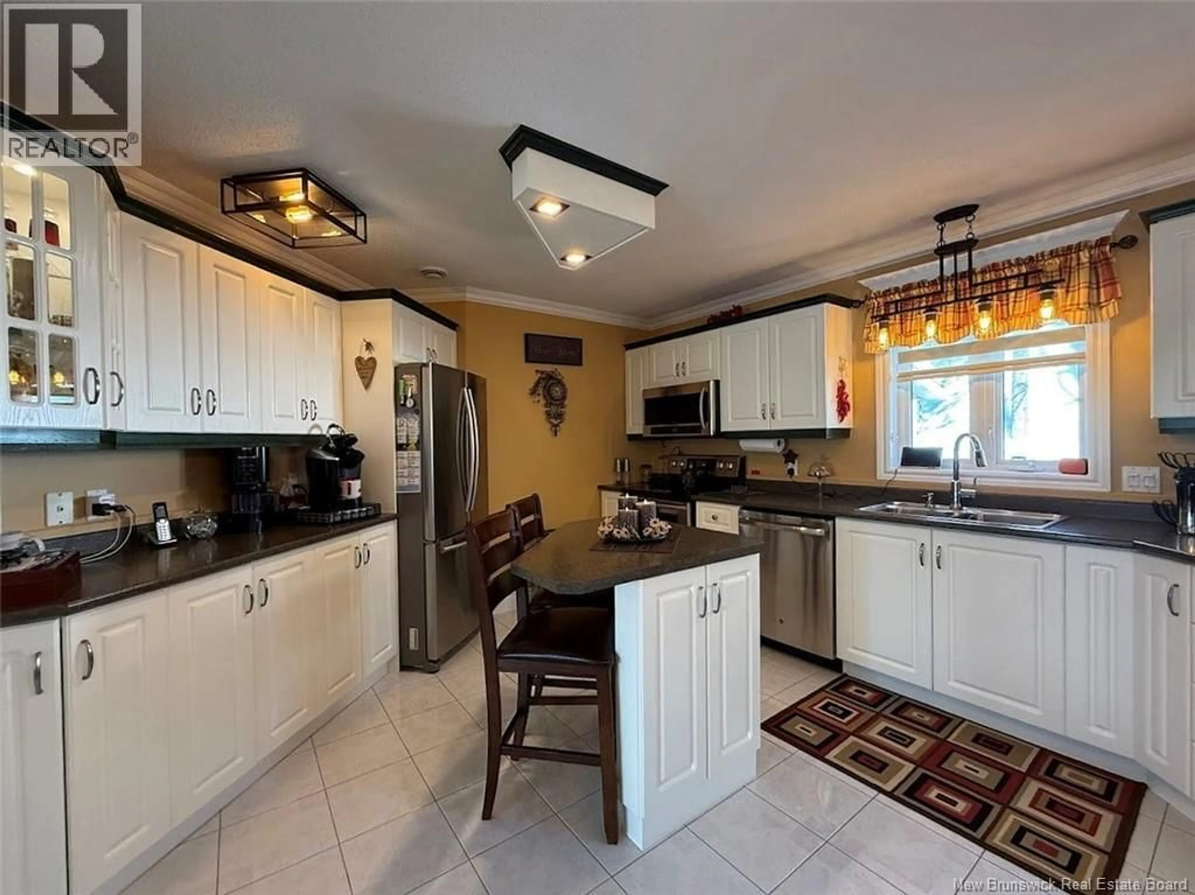 Open concept kitchen, ceramic/tile floor for 56 DES GOUVERNEURS STREET, Edmundston New Brunswick E3V4H5