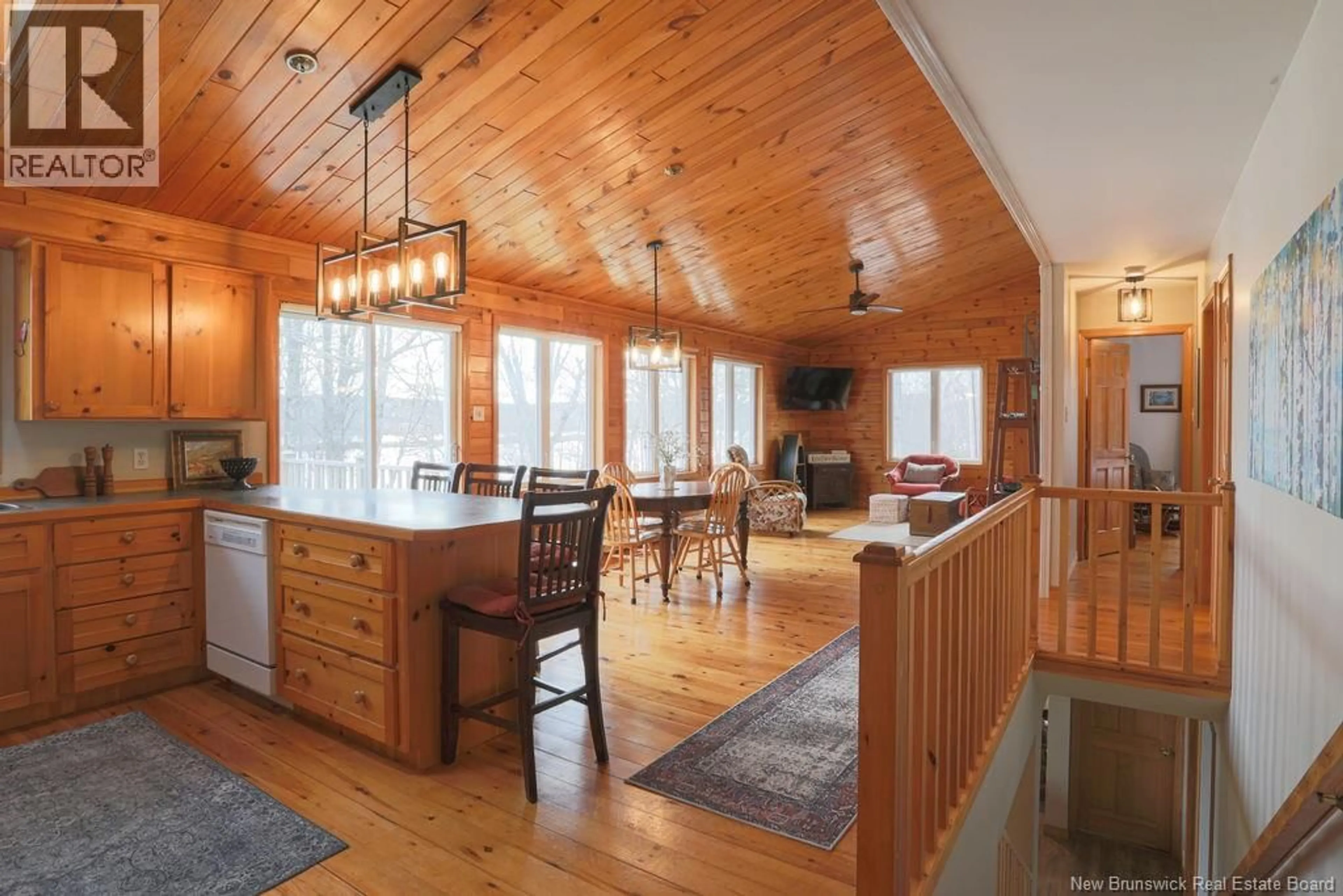 Open concept kitchen, wood/laminate floor for 25 OAK LANE, Coles Island New Brunswick E2C2M4