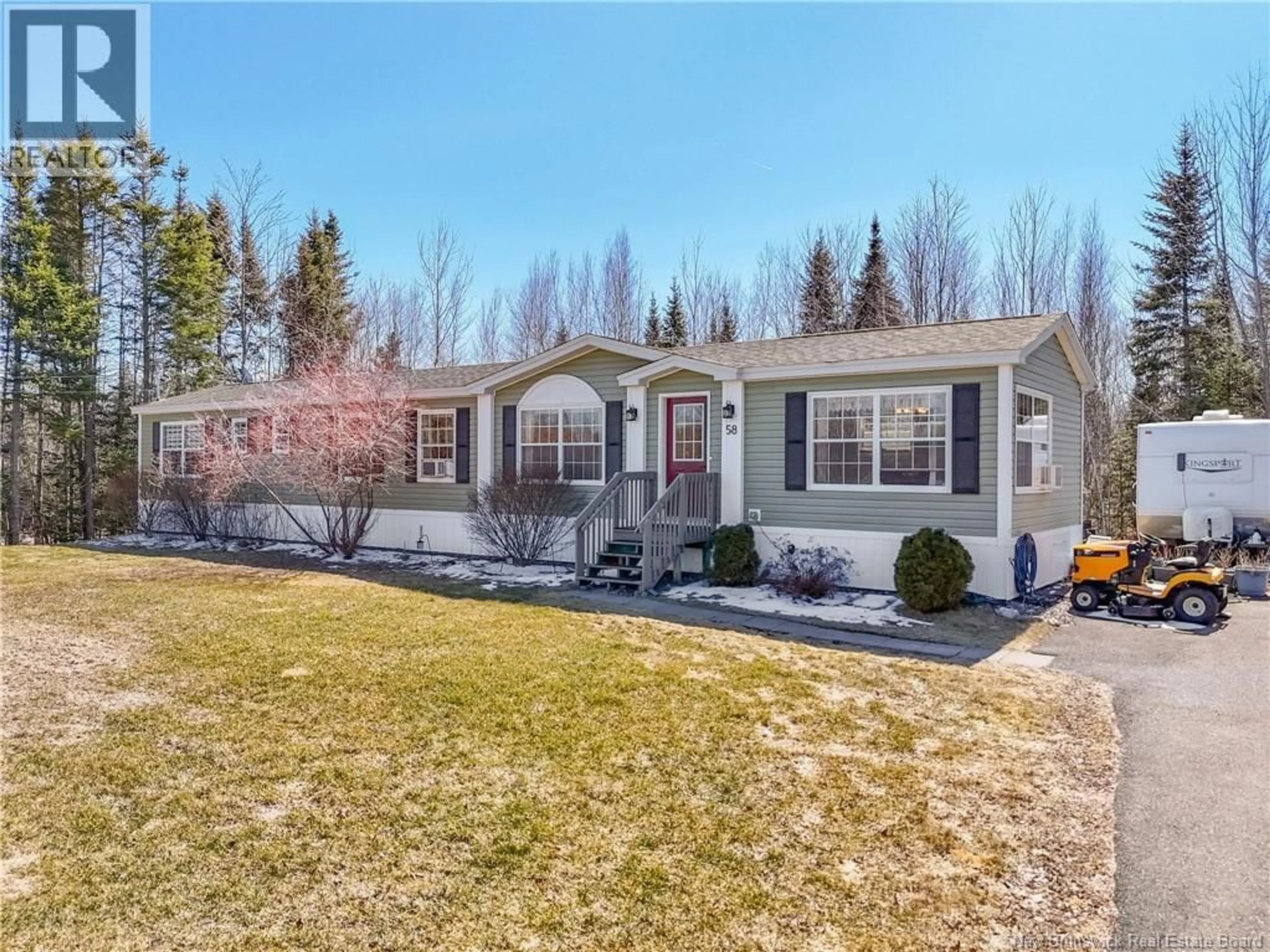 Home with vinyl exterior material, street for 58 O'LEARY STREET, Rusagonis New Brunswick E3B0R3