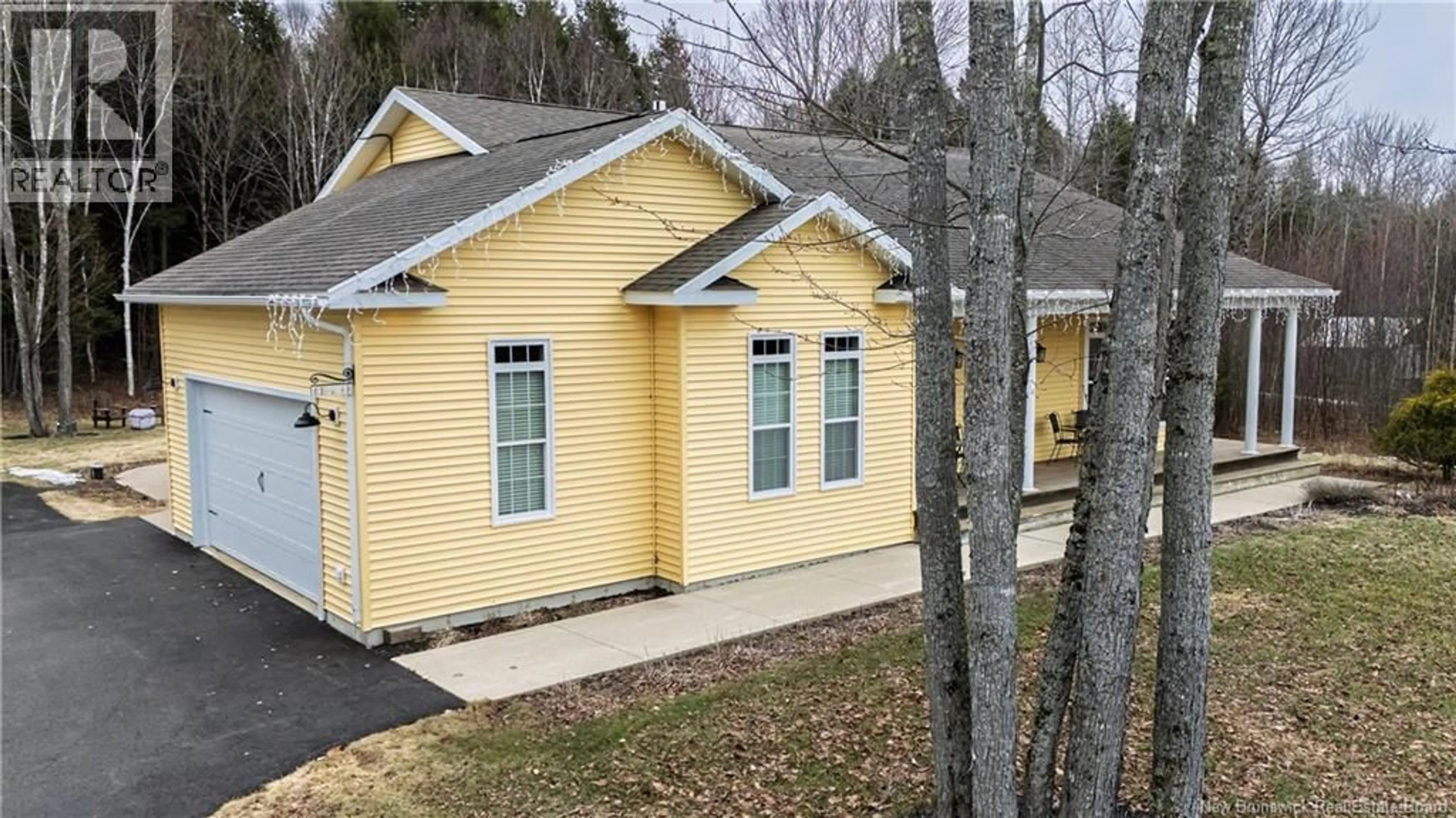 Home with vinyl exterior material, street for 144 COUNTRY WOOD LANE, Richibucto Road New Brunswick E3A0Y6