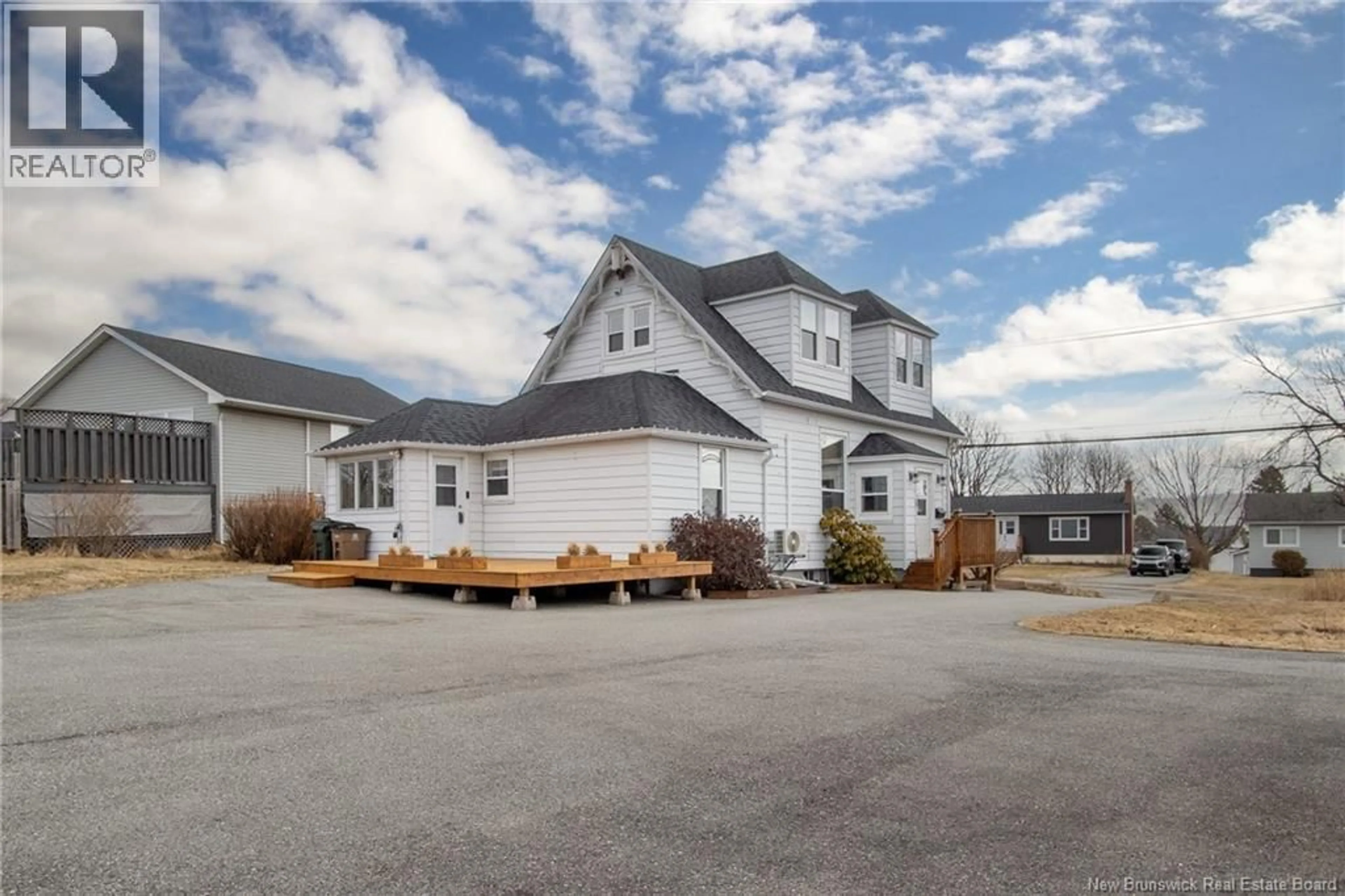 A pic from outside/outdoor area/front of a property/back of a property/a pic from drone, street for 754 SAND COVE ROAD, Saint John New Brunswick E2M3E1