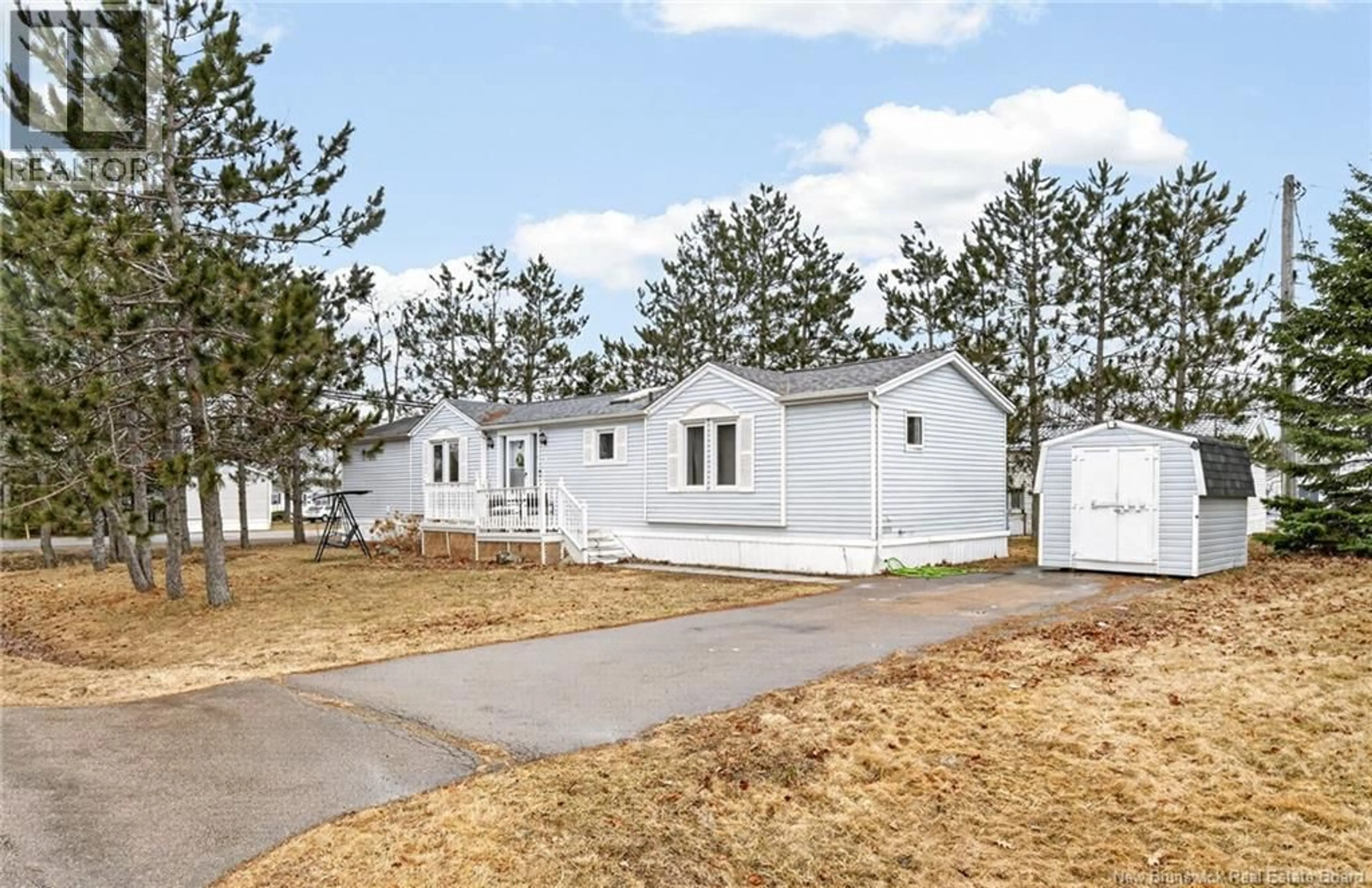 Home with vinyl exterior material, street for 1 HUMMINGBIRD STREET, Moncton New Brunswick E1H2W8