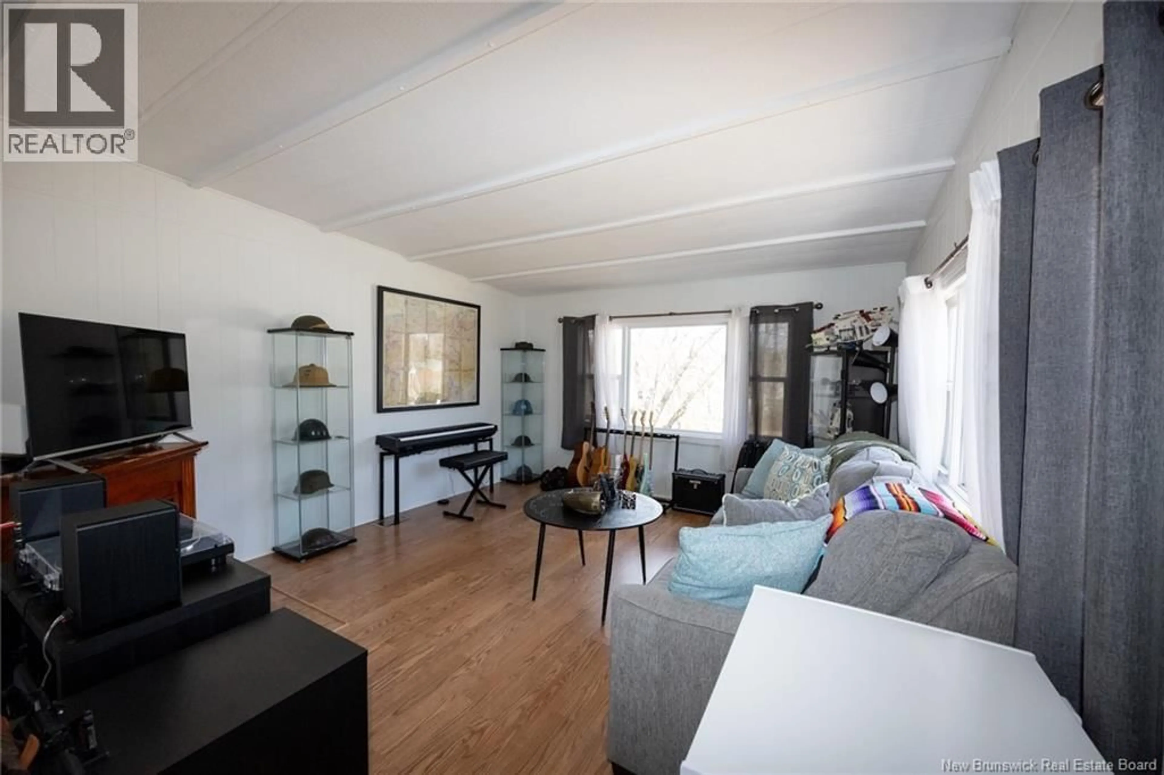 Living room with furniture, wood/laminate floor for 362 FAIRMOUNT DRIVE, Fredericton New Brunswick E3B7P6