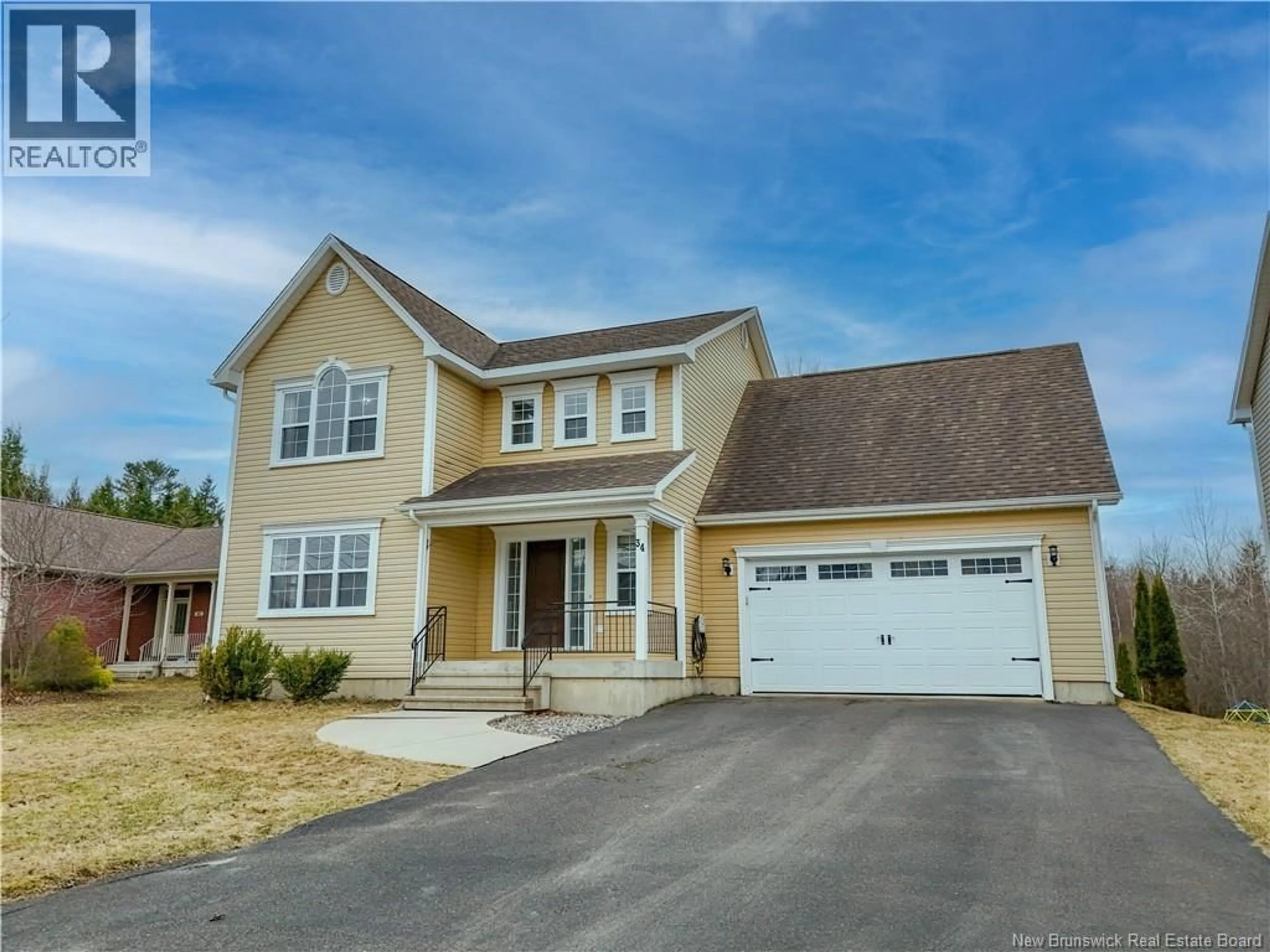 Home with vinyl exterior material, street for 34 MAVIS COURT, Fredericton New Brunswick E3B0E9