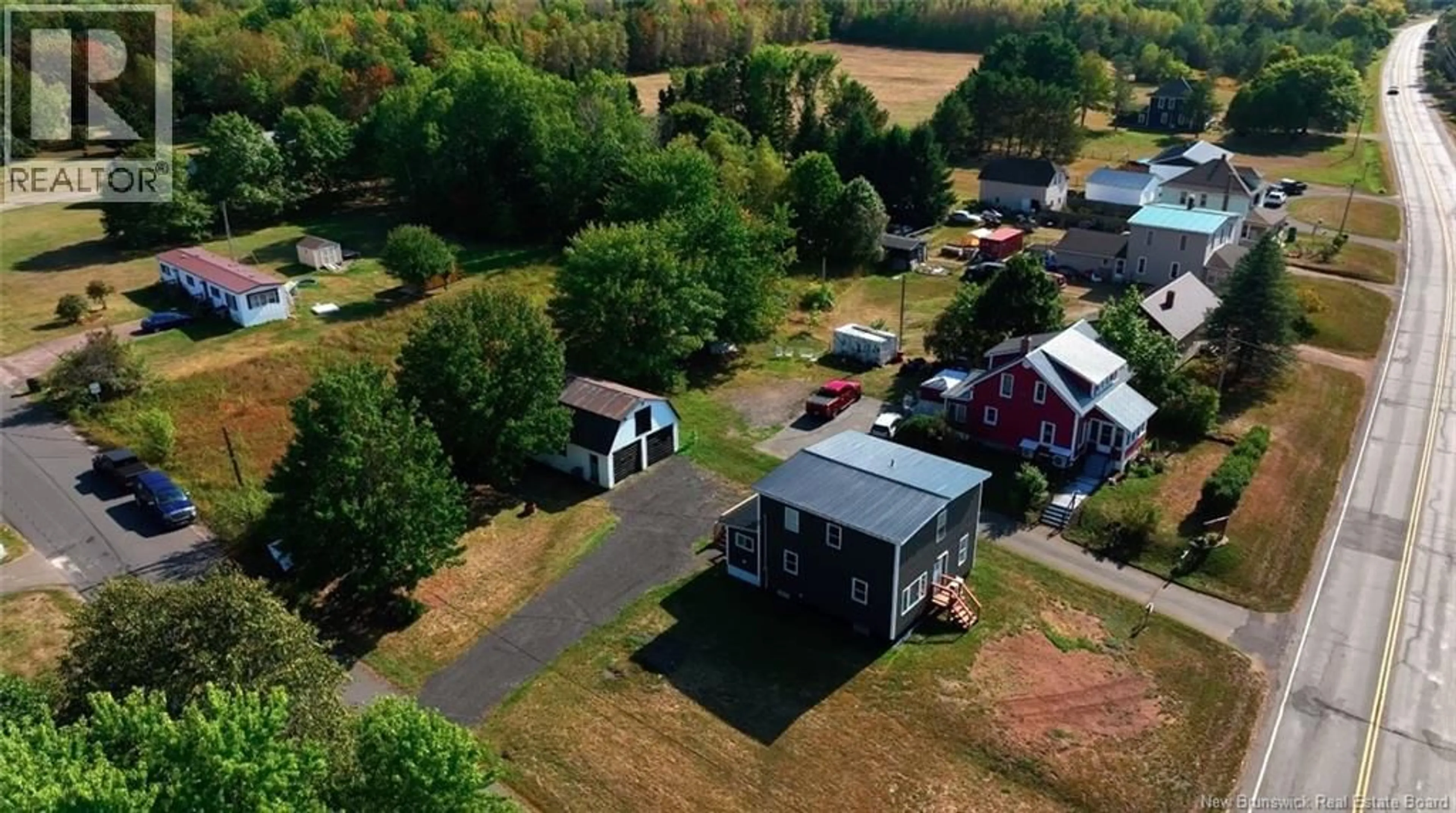 A pic from outside/outdoor area/front of a property/back of a property/a pic from drone, unknown for 8 DUFFERIN ROAD, Chipman New Brunswick E4B2Y6