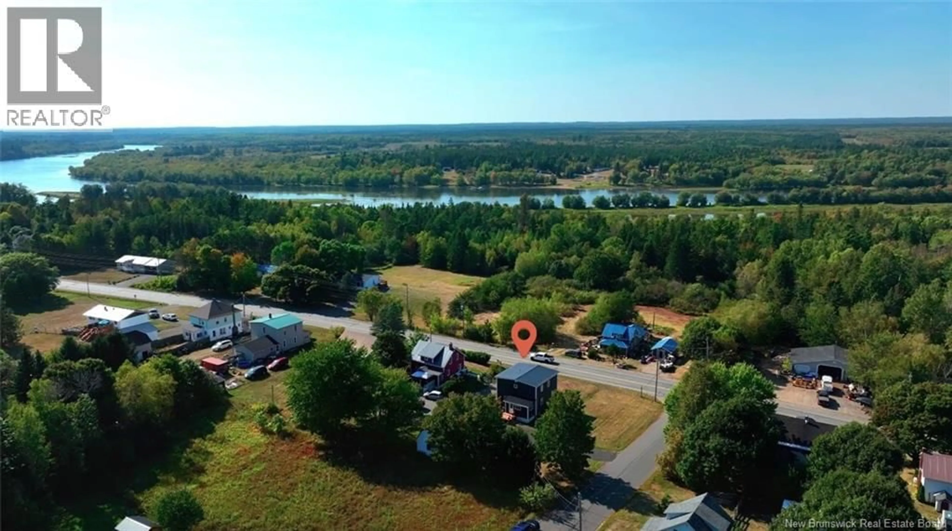 A pic from outside/outdoor area/front of a property/back of a property/a pic from drone, water/lake/river/ocean view for 8 DUFFERIN ROAD, Chipman New Brunswick E4B2Y6