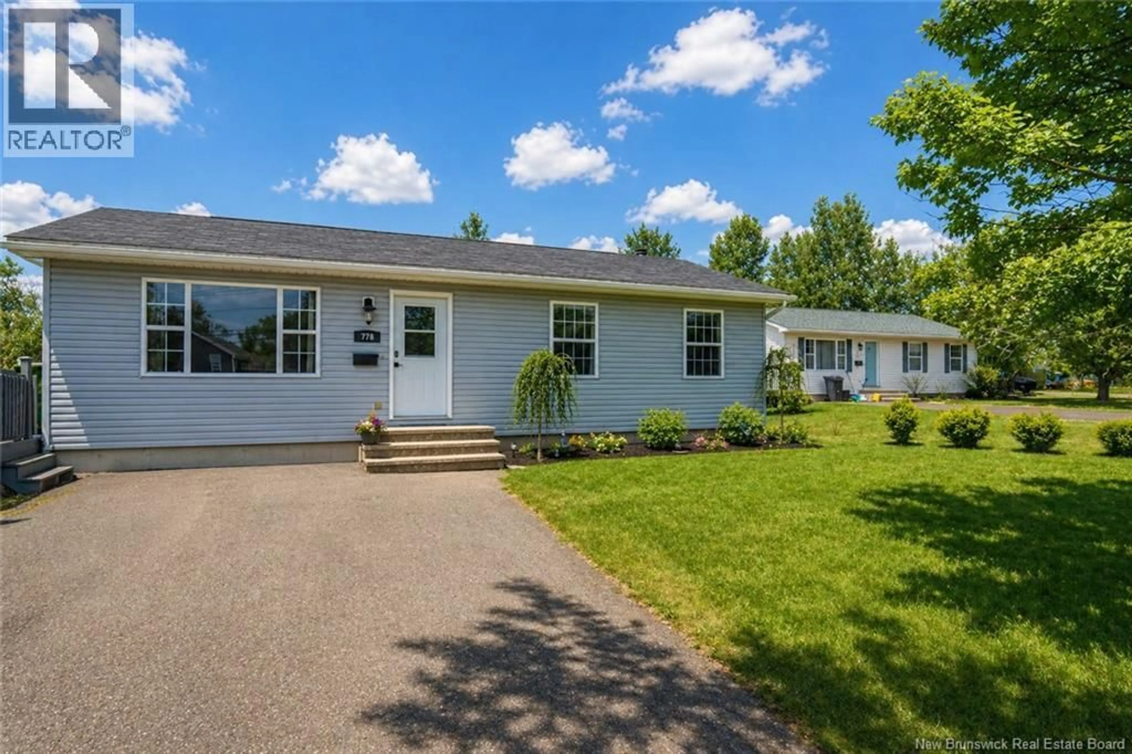 Home with vinyl exterior material, street for 778 WAASIS ROAD, Oromocto New Brunswick E2V2N9