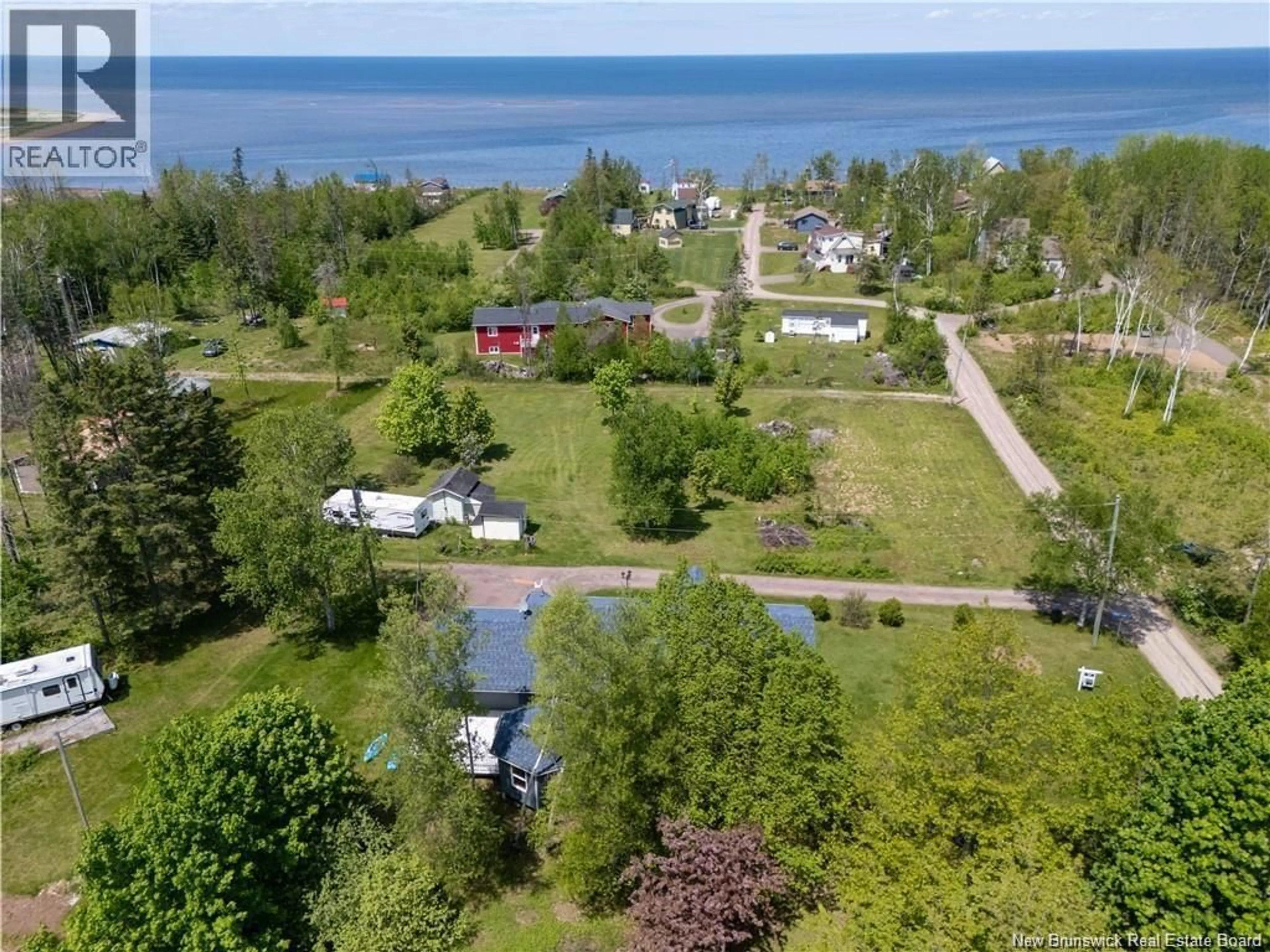 A pic from outside/outdoor area/front of a property/back of a property/a pic from drone, water/lake/river/ocean view for 4 BEAU MATIN LANE, Grand-Barachois New Brunswick E4P6T8