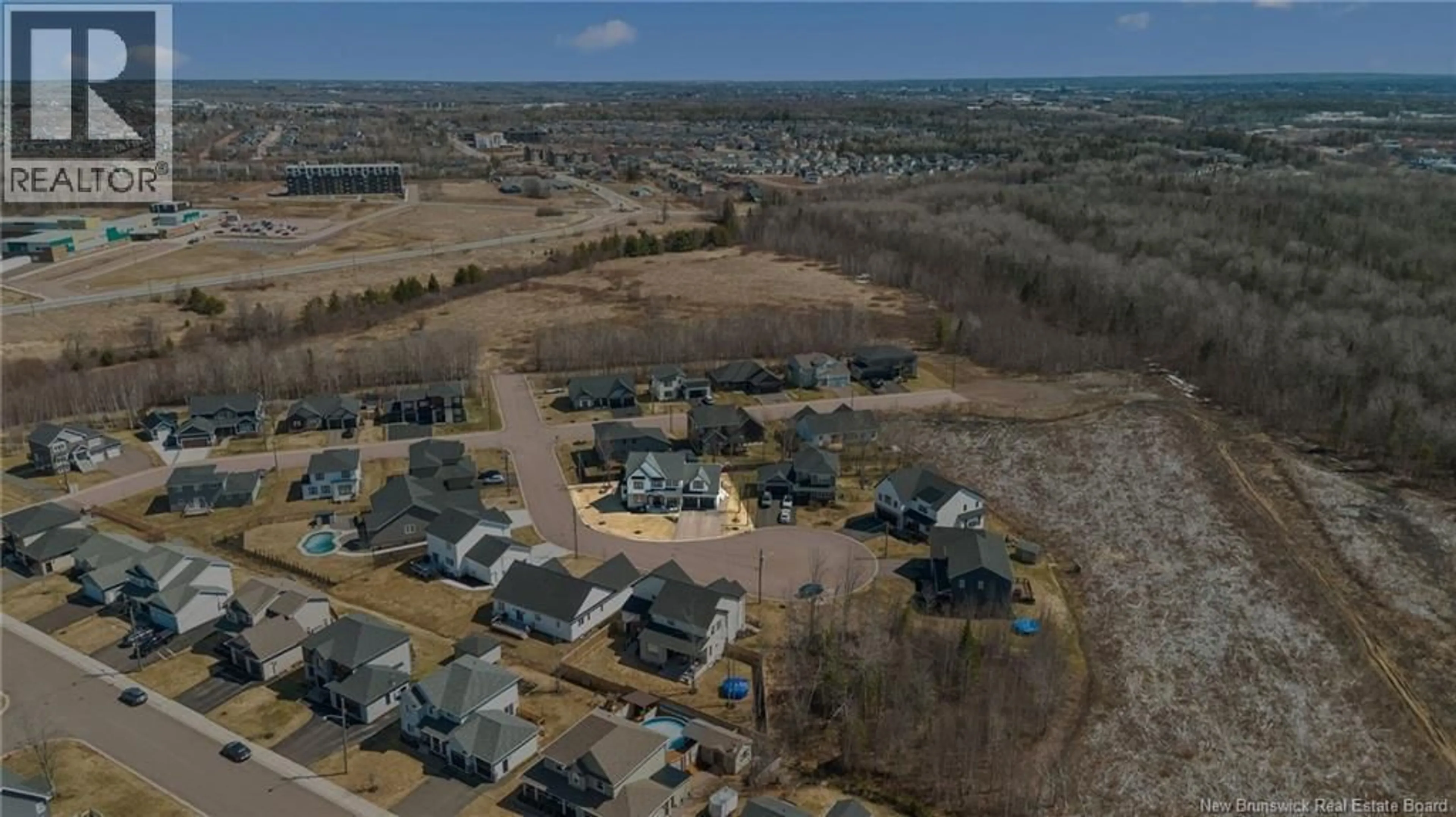 A pic from outside/outdoor area/front of a property/back of a property/a pic from drone, unknown for 20 VALENTIN COURT, Moncton New Brunswick E1G6B4