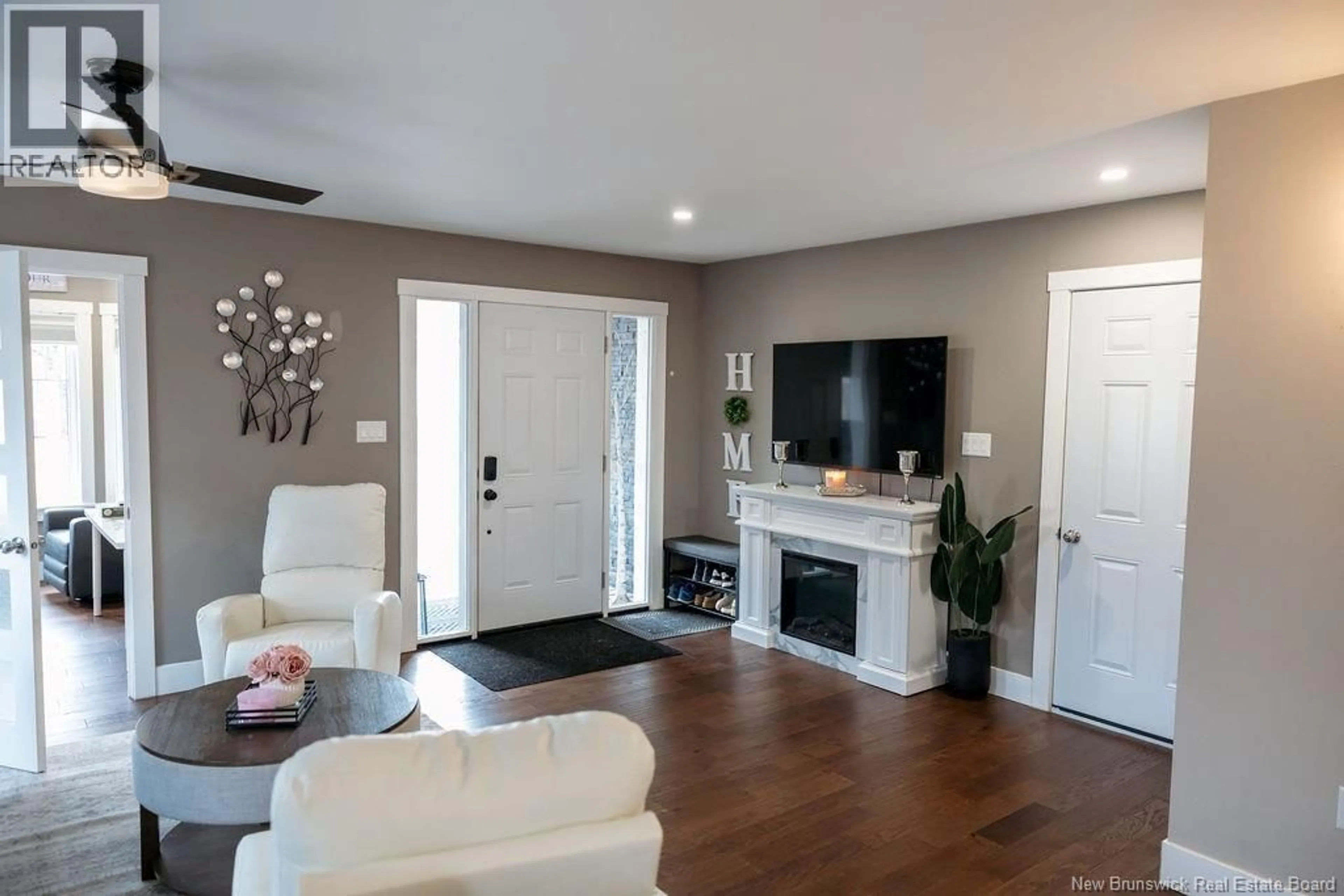 Living room with furniture, wood/laminate floor for 17 NIGHTINGALE COURT, Florenceville-Bristol New Brunswick E7L0C6