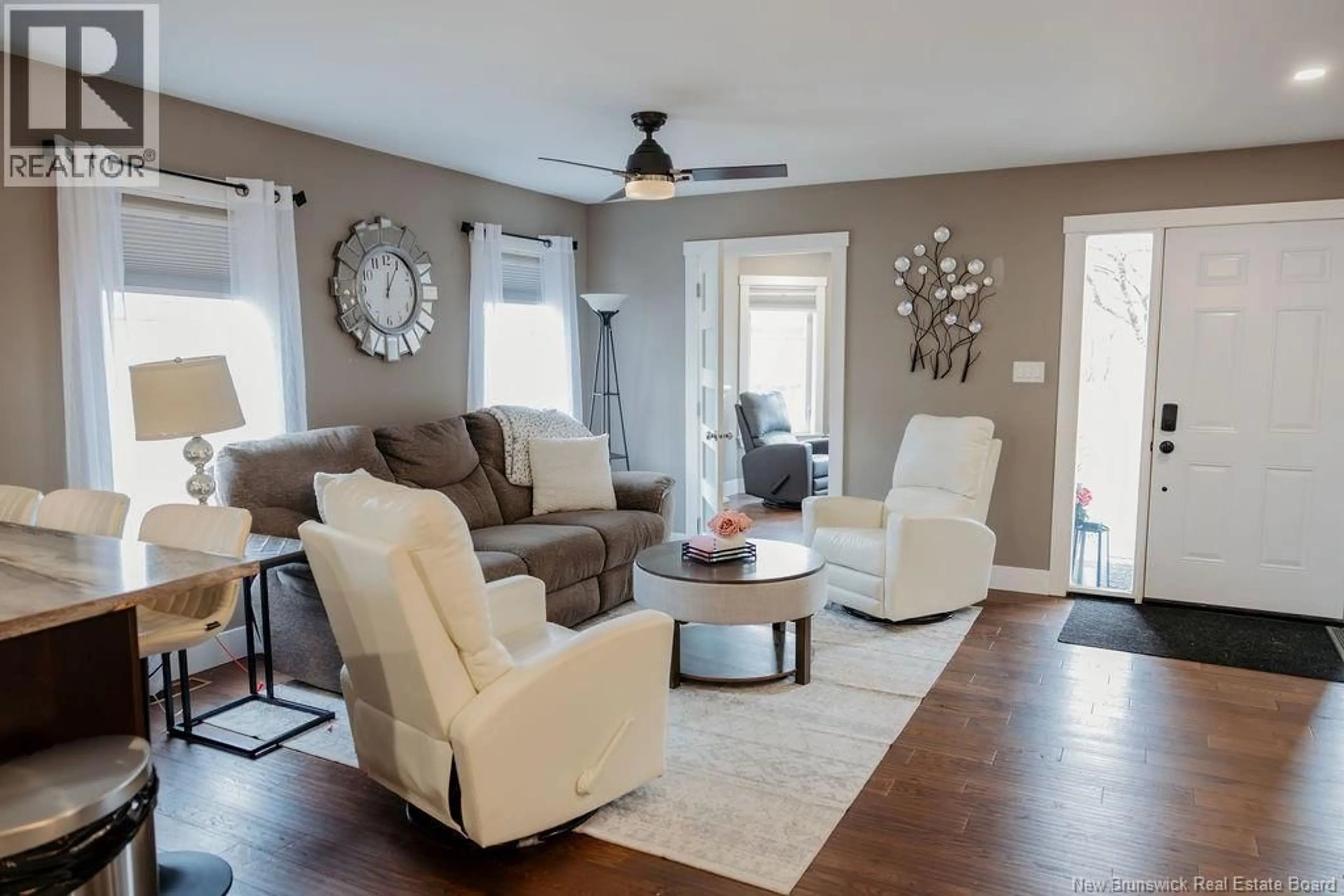 Living room with furniture, wood/laminate floor for 17 NIGHTINGALE COURT, Florenceville-Bristol New Brunswick E7L0C6