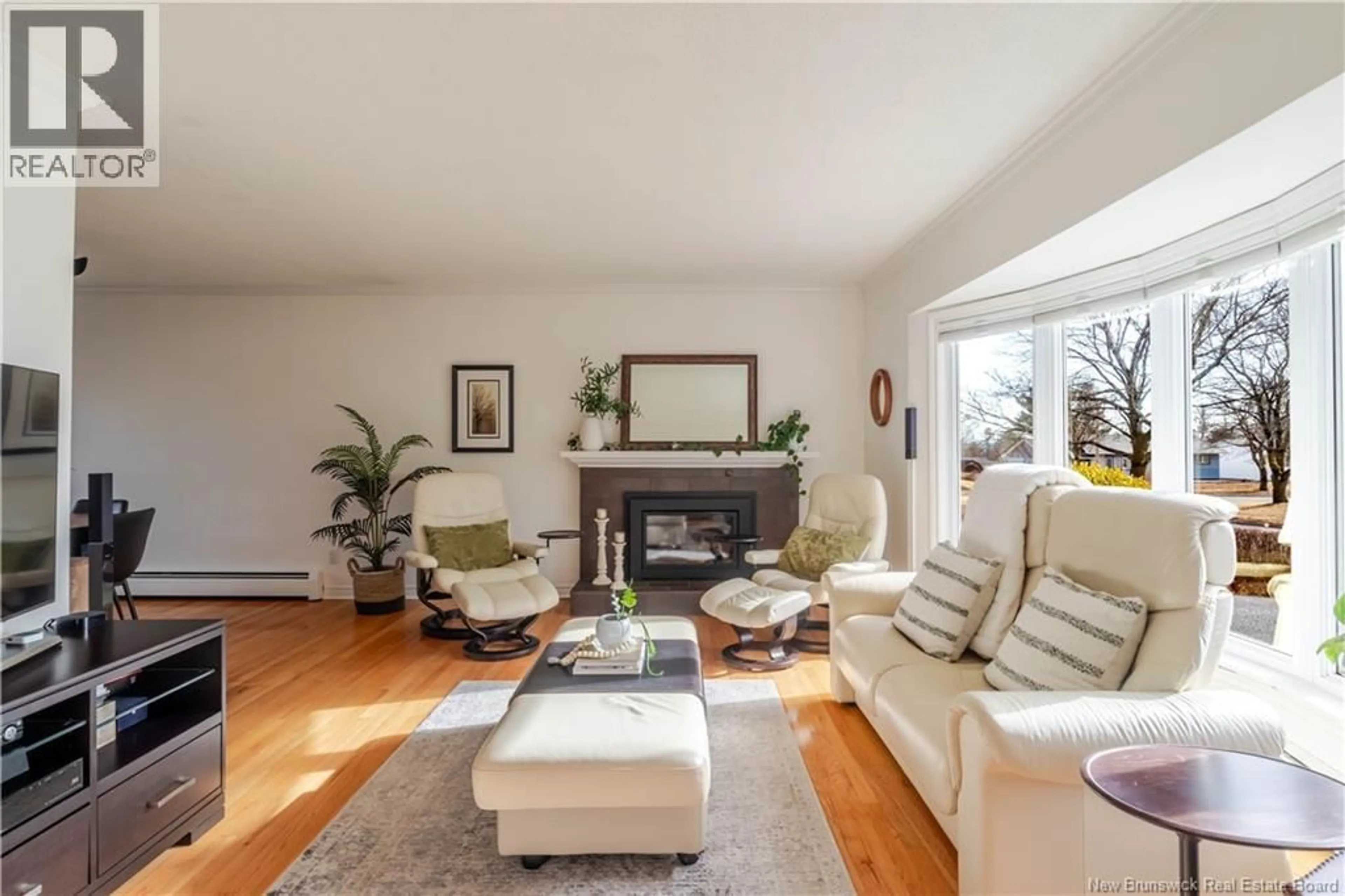 Living room with furniture, wood/laminate floor for 119 STANLEY STREET, Fredericton New Brunswick E3B3A2
