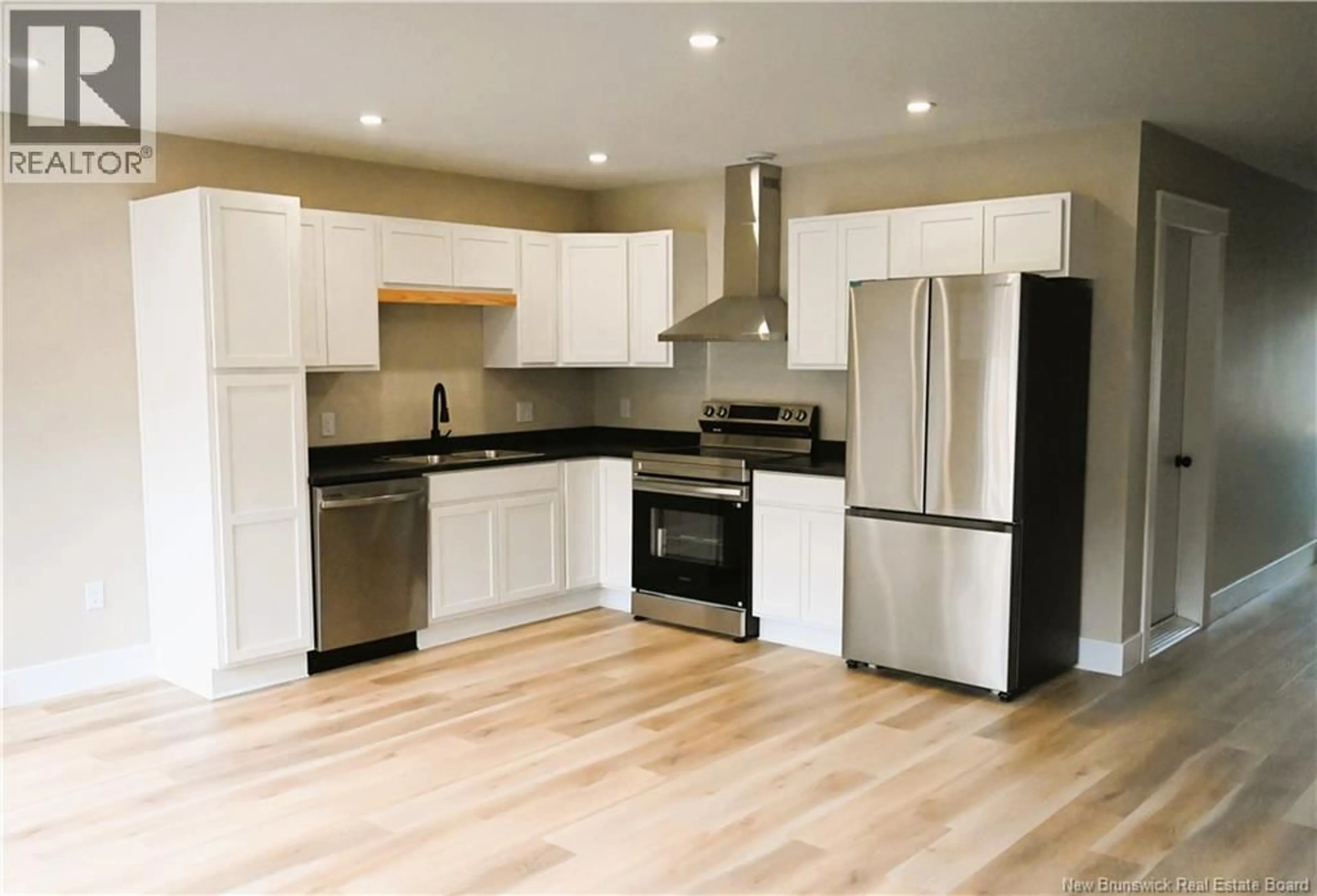 Open concept kitchen, wood/laminate floor for 177 ARLINGTON CRESCENT, Saint John New Brunswick E2K0G4