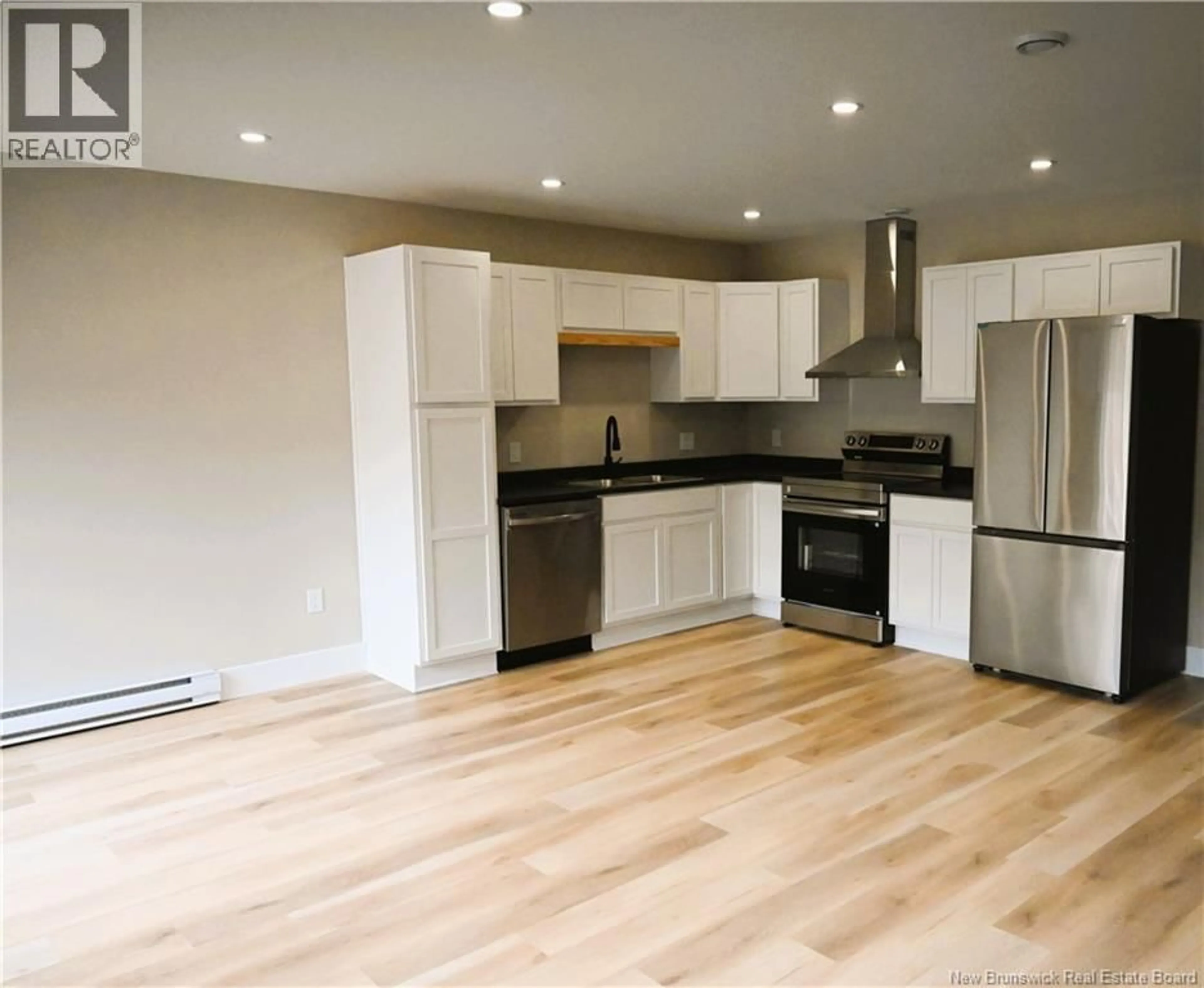 Open concept kitchen, wood/laminate floor for 177 ARLINGTON CRESCENT, Saint John New Brunswick E2K0G4