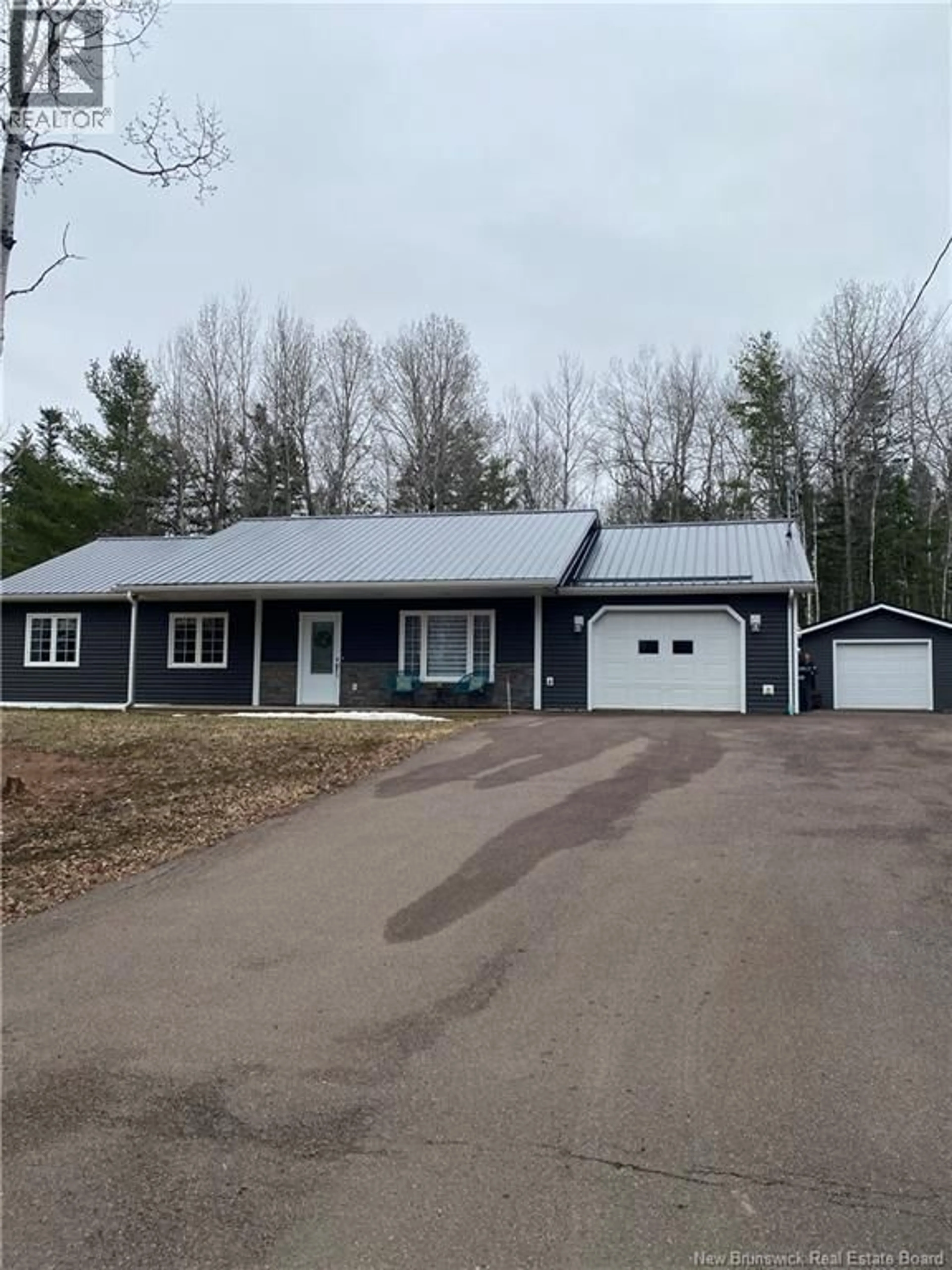 Home with vinyl exterior material, street for 15 WOODWORTH STREET, Lower Coverdale New Brunswick E1J1J5