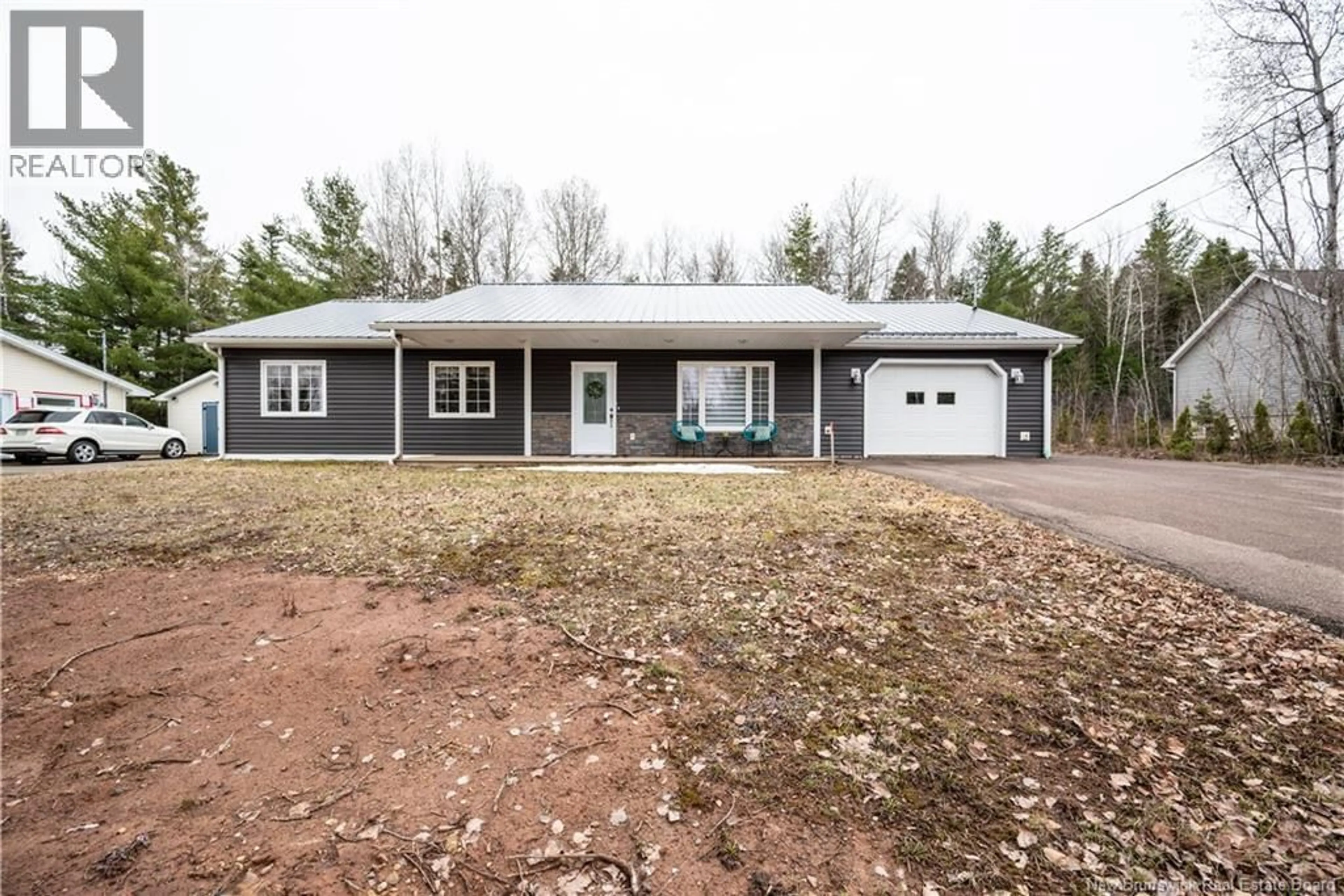 Home with vinyl exterior material, street for 15 WOODWORTH STREET, Lower Coverdale New Brunswick E1J1J5