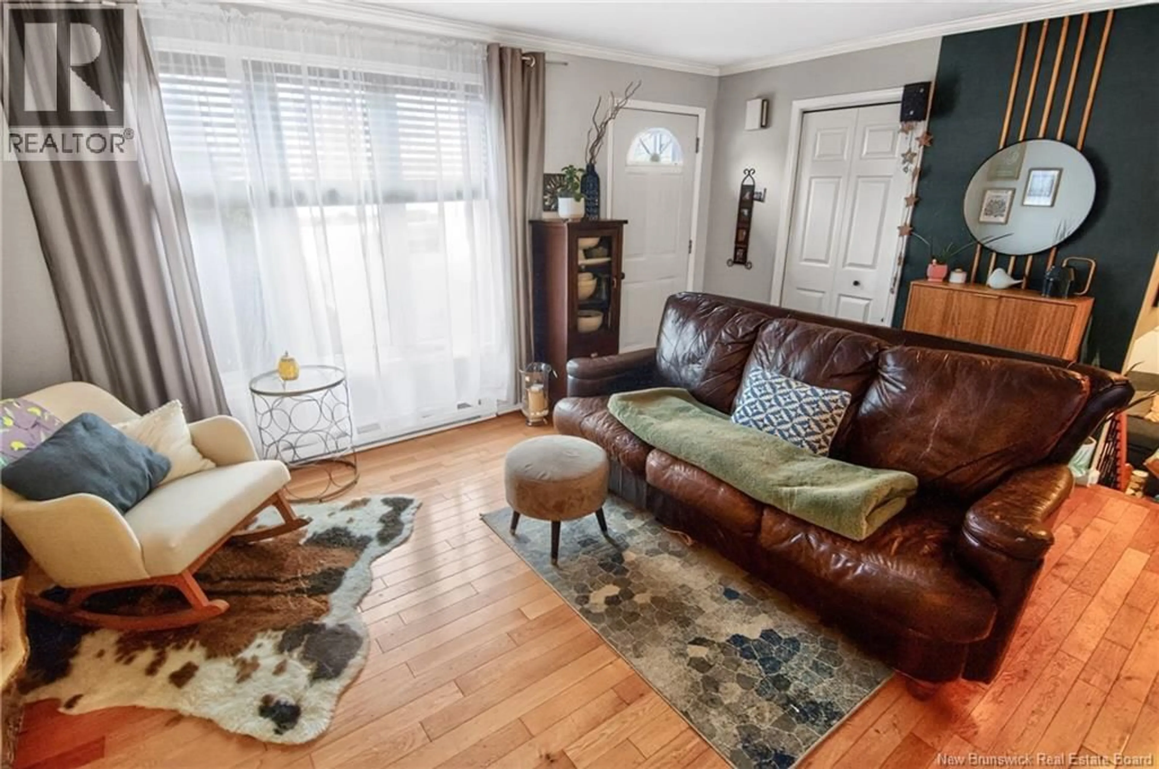 Living room with furniture, wood/laminate floor for 41 ROCKMAPLE DRIVE, Moncton New Brunswick E1G2H1