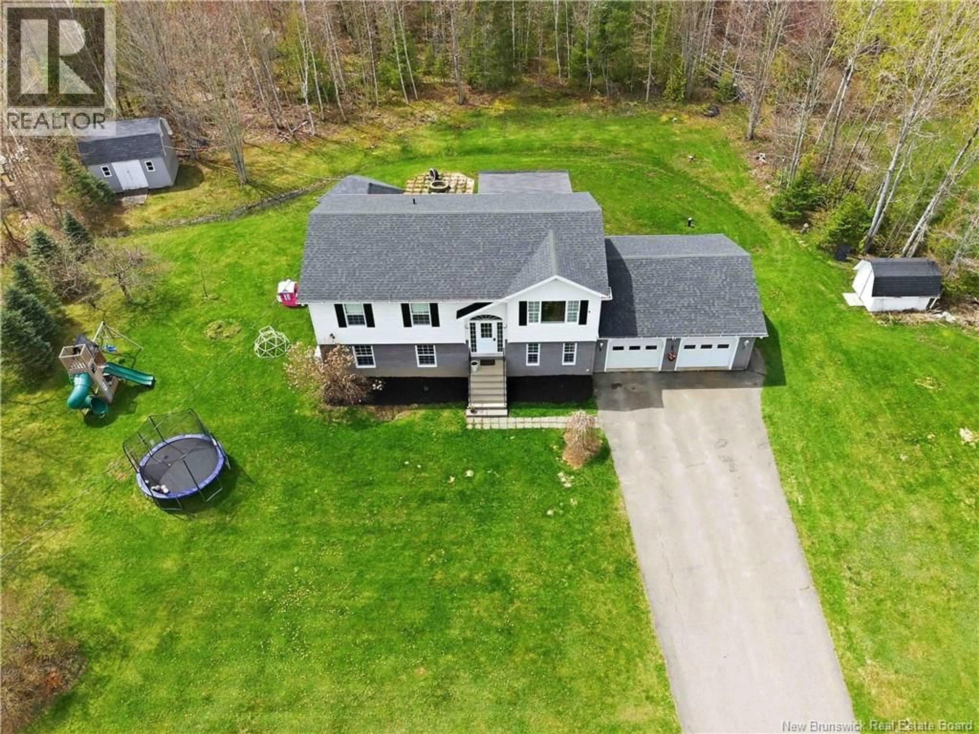 A pic from outside/outdoor area/front of a property/back of a property/a pic from drone, street for 83 BROOKDALE DRIVE, Hanwell New Brunswick E3C1M5