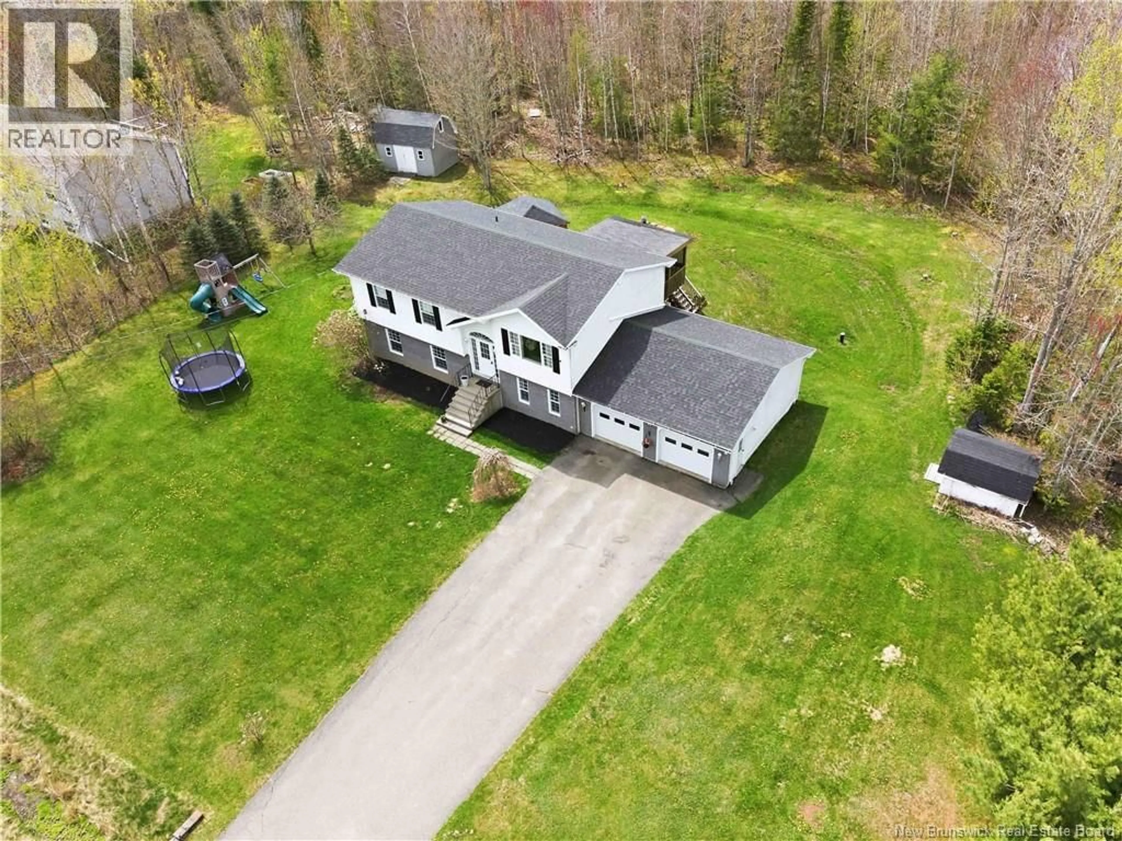 A pic from outside/outdoor area/front of a property/back of a property/a pic from drone, unknown for 83 BROOKDALE DRIVE, Hanwell New Brunswick E3C1M5