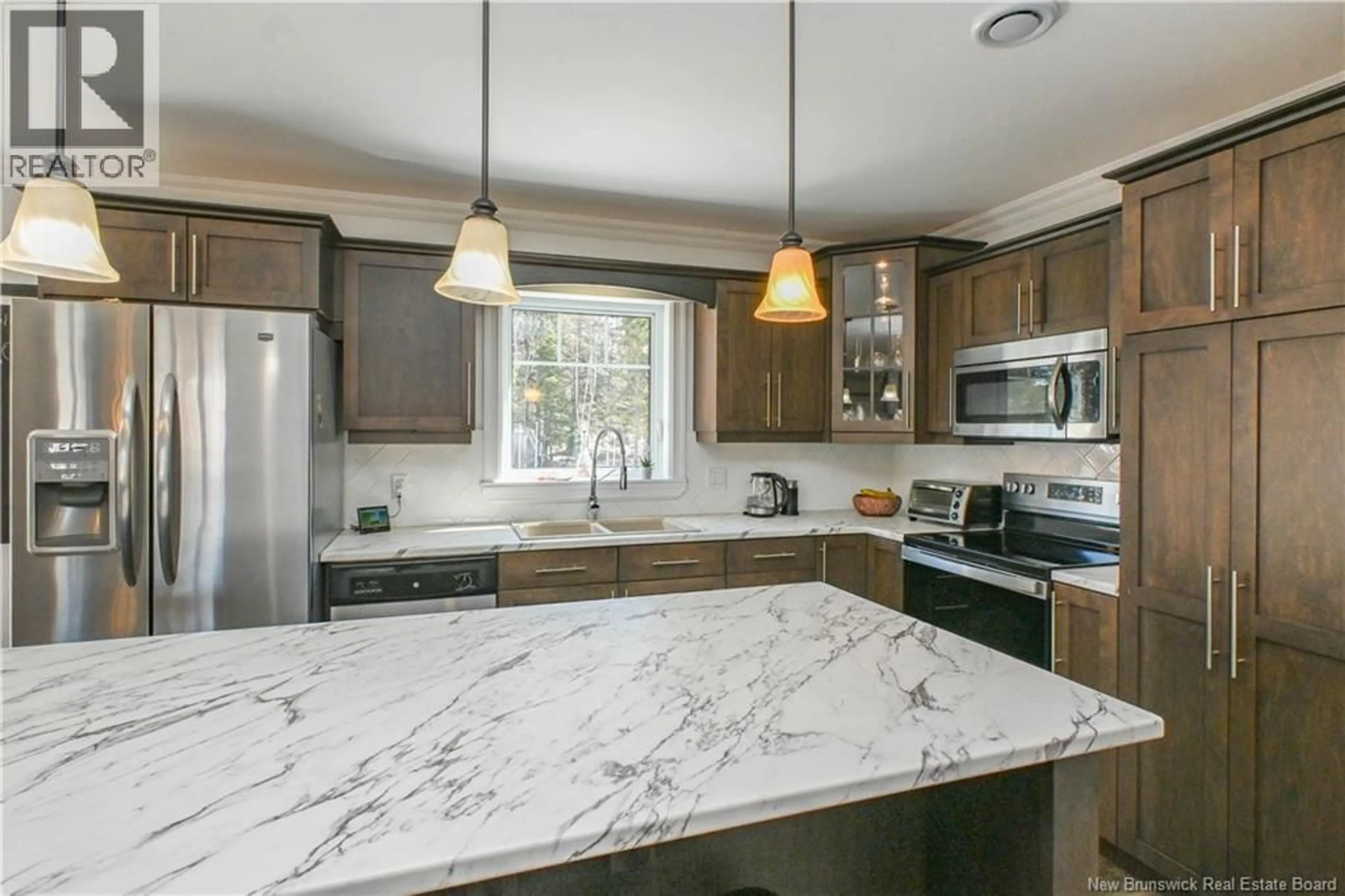Open concept kitchen, ceramic/tile floor for 37 BOIS-HÉBERT ROAD, Saint-Isidore New Brunswick E8M0A3