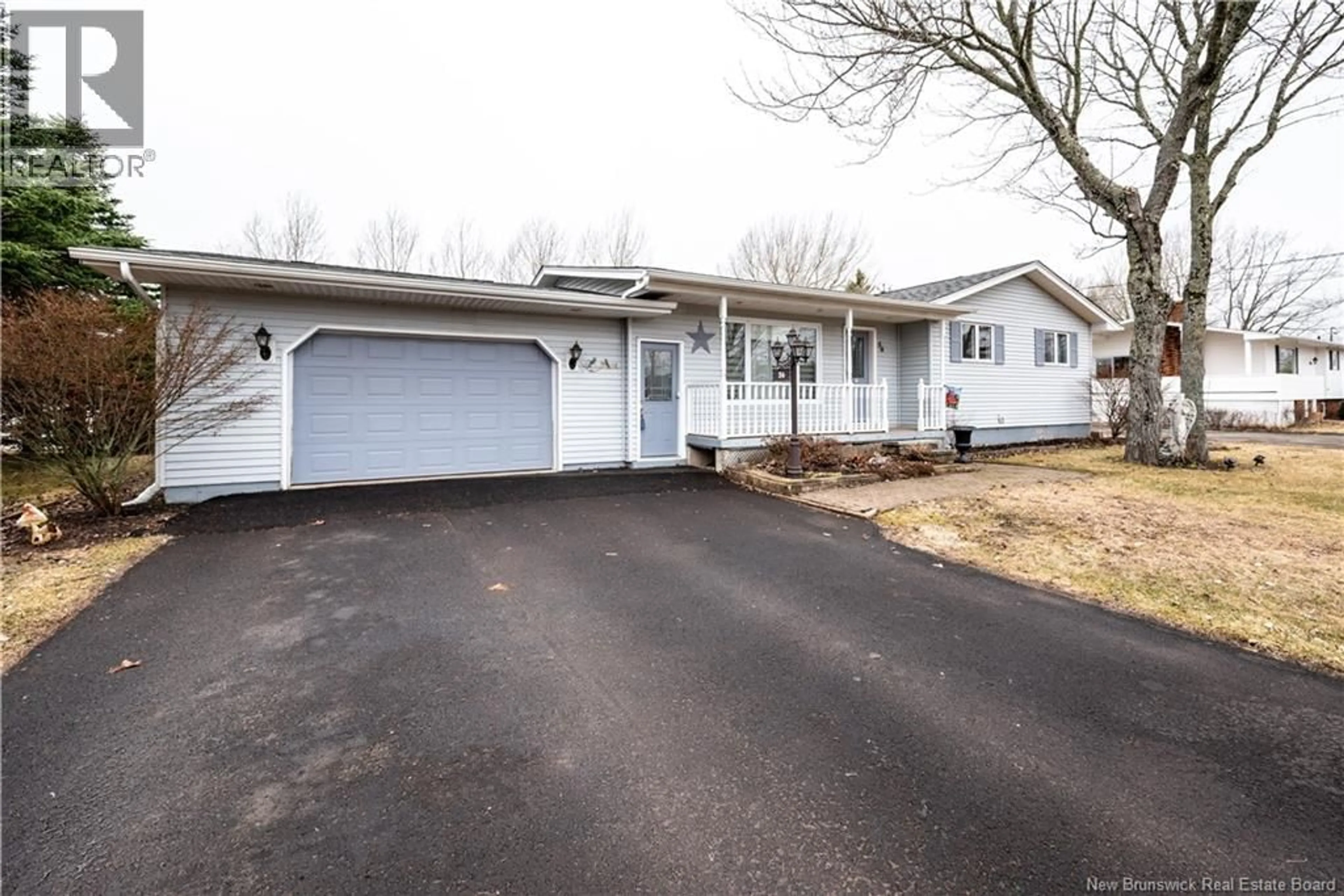 Home with vinyl exterior material, street for 56 YVON STREET, Saint-Antoine New Brunswick E4V1P8