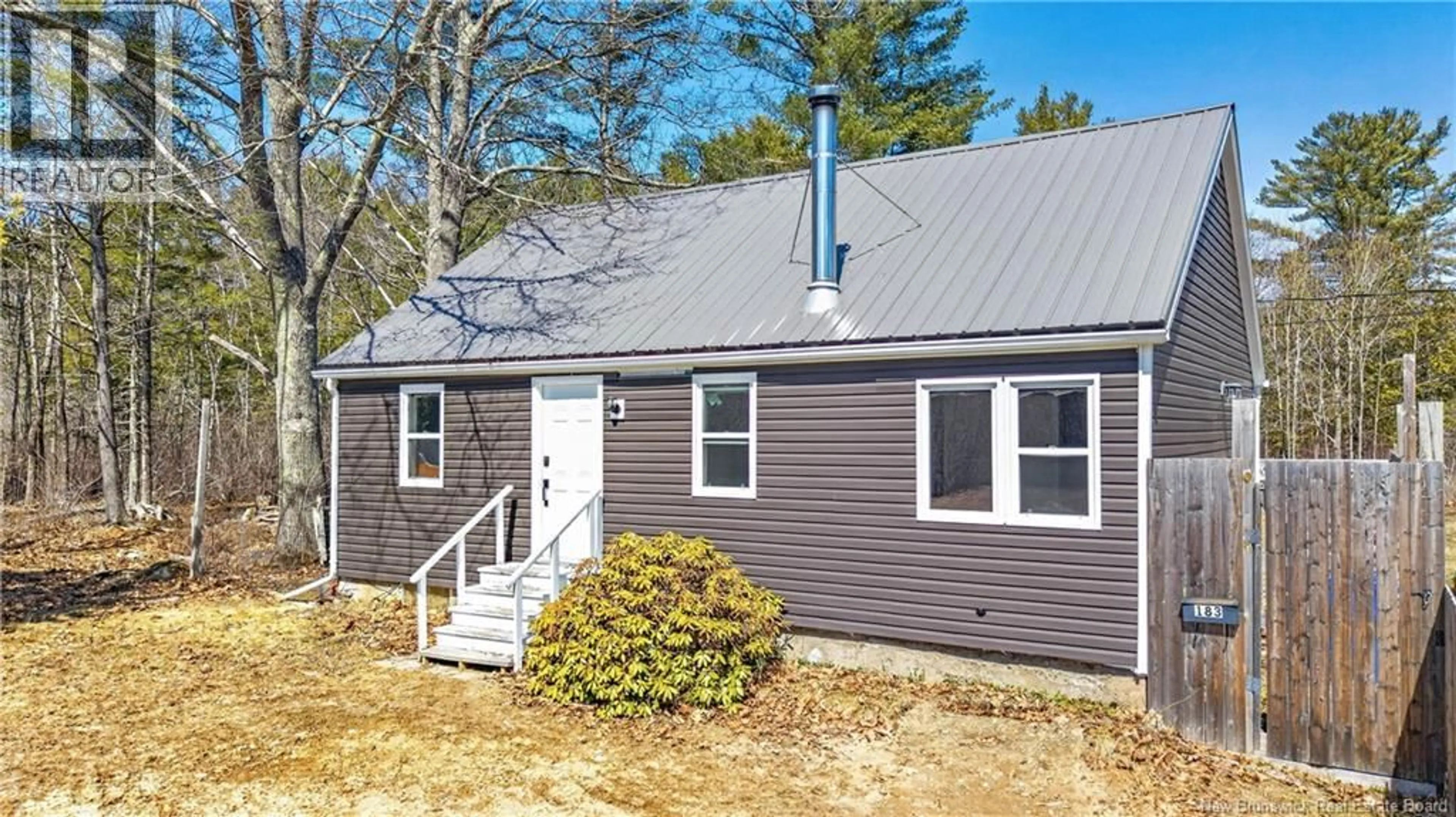 Home with vinyl exterior material, street for 183 UNION STREET, St. Stephen New Brunswick E3L1W2