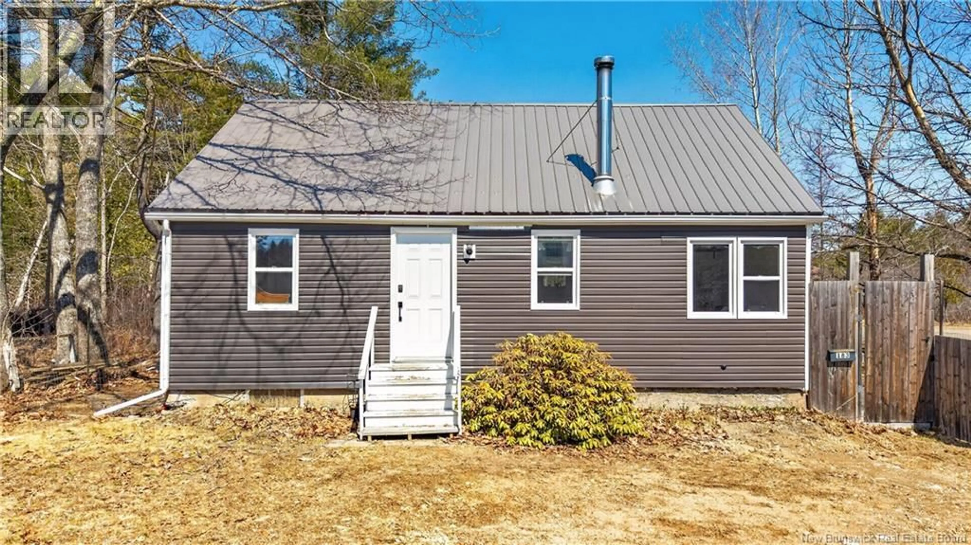 Home with vinyl exterior material, street for 183 UNION STREET, St. Stephen New Brunswick E3L1W2