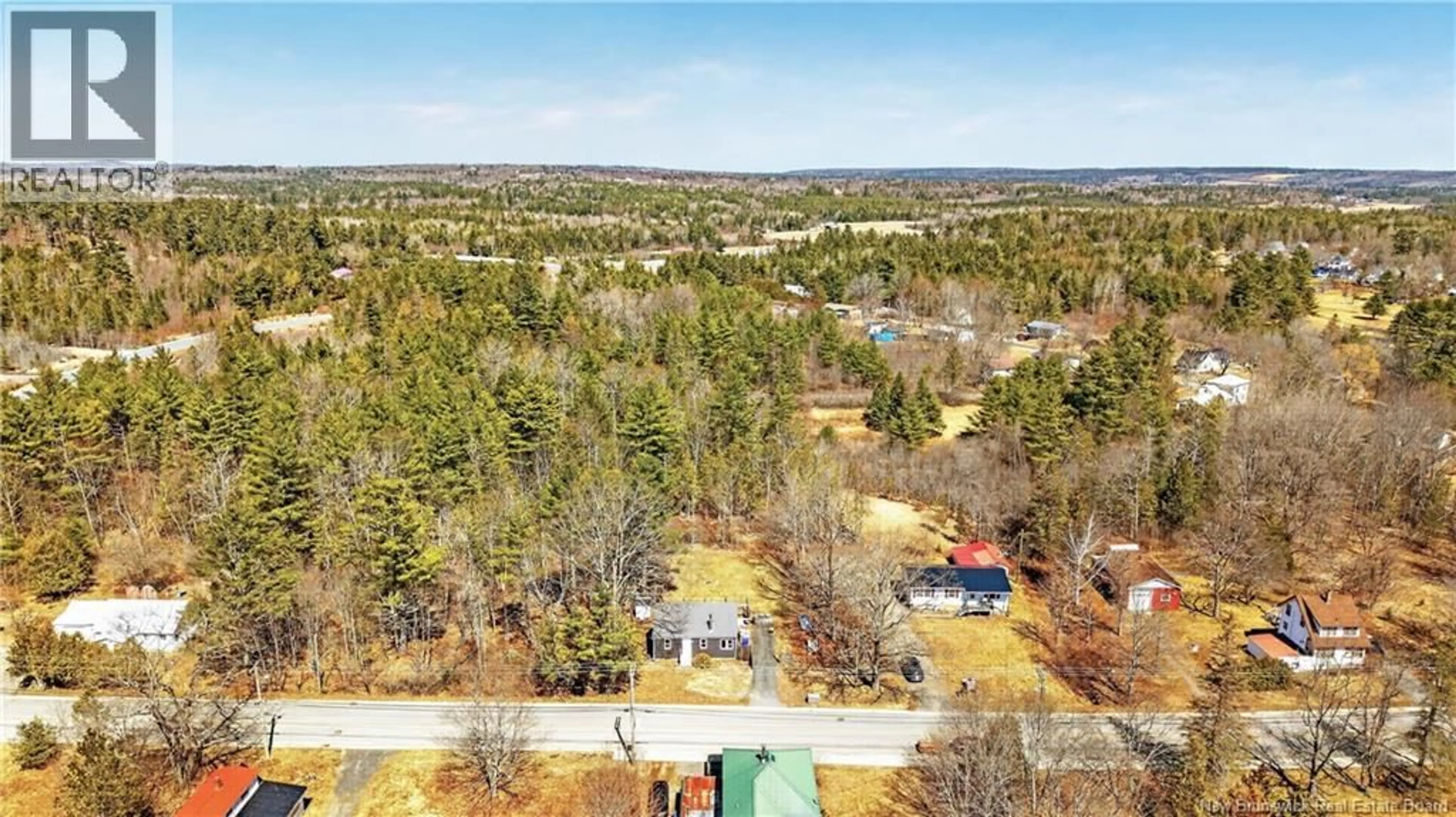 A pic from outside/outdoor area/front of a property/back of a property/a pic from drone, forest/trees view for 183 UNION STREET, St. Stephen New Brunswick E3L1W2