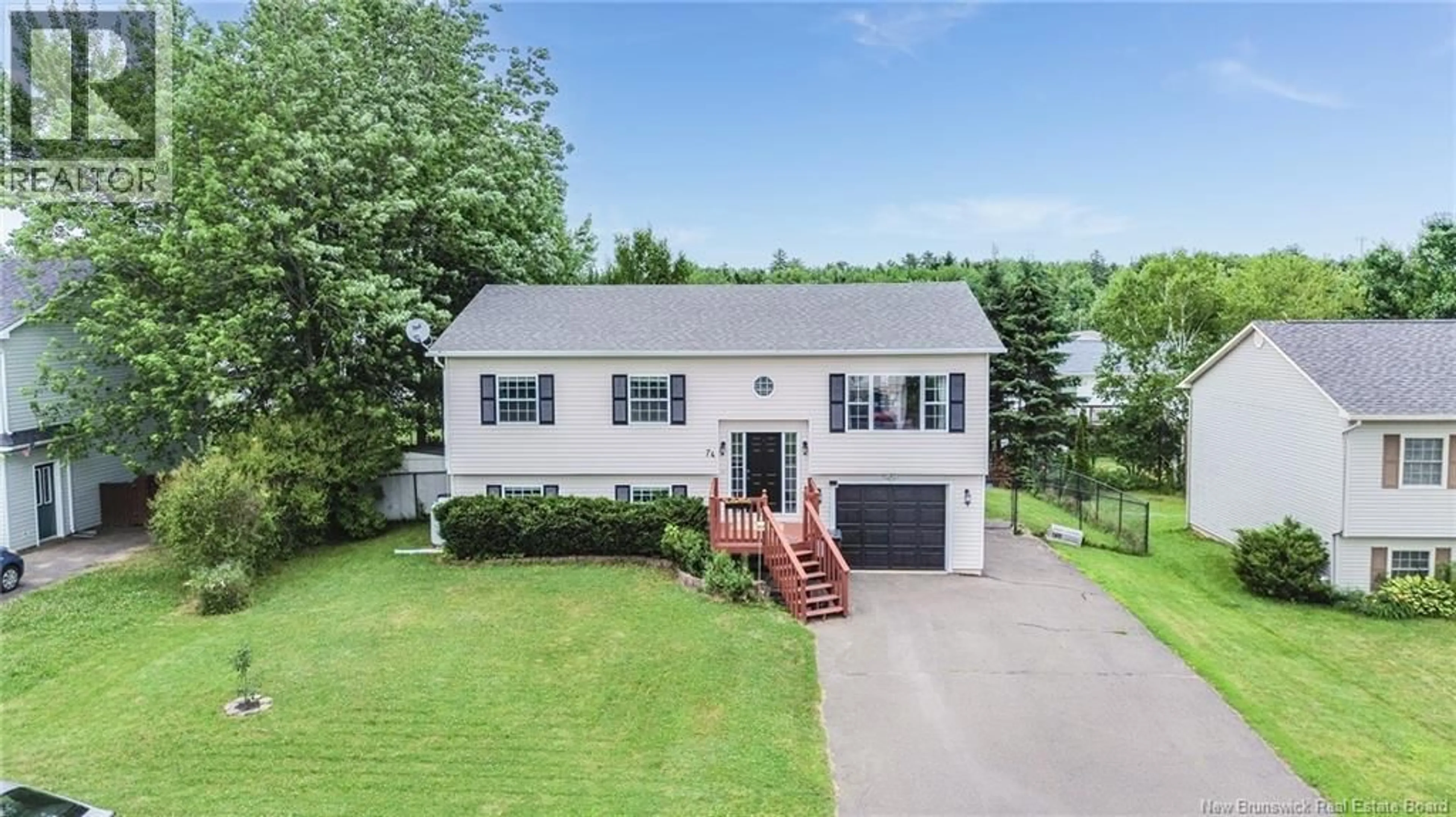 A pic from outside/outdoor area/front of a property/back of a property/a pic from drone, unknown for 74 DUFFIE DRIVE, Oromocto New Brunswick E2V4L3
