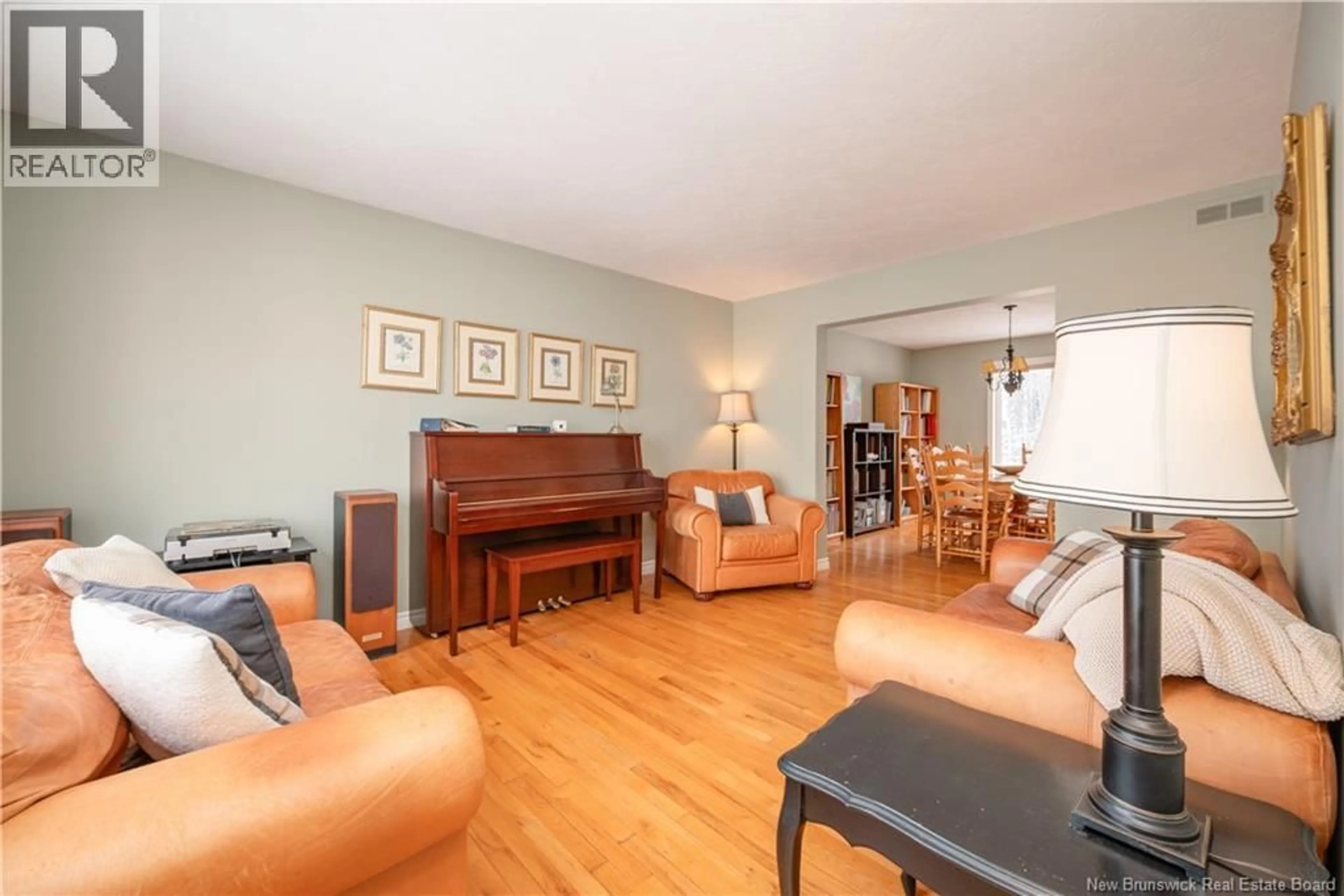 Living room with furniture, wood/laminate floor for 523 ALPHÉE STREET, Dieppe New Brunswick E1A6W6