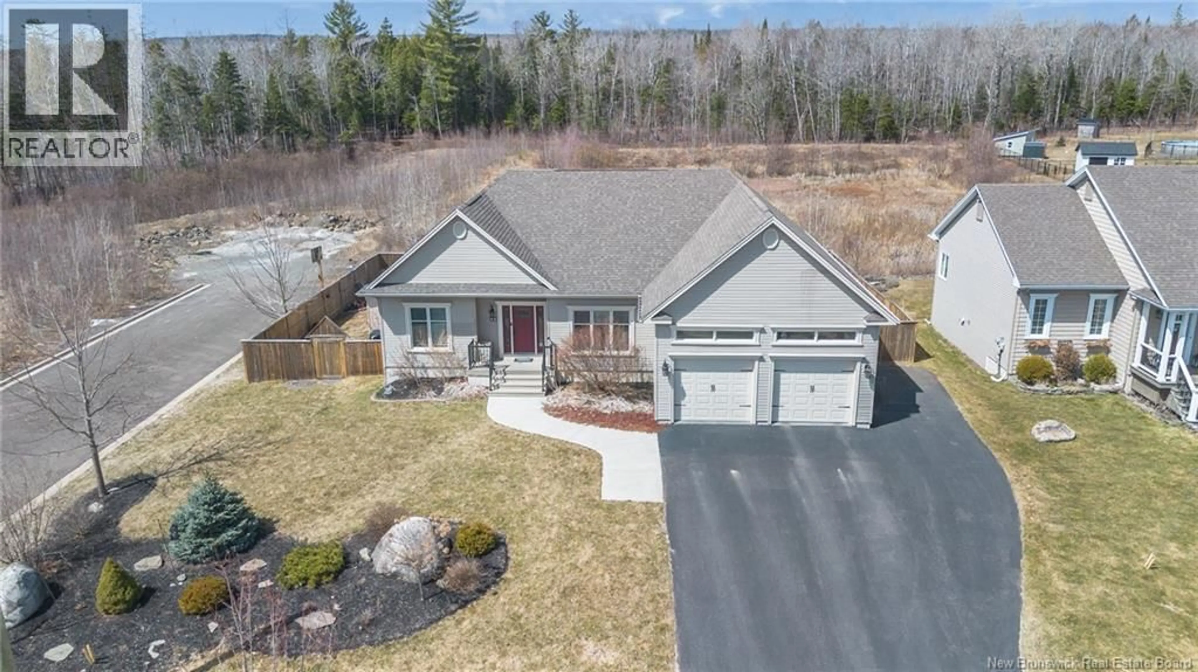 A pic from outside/outdoor area/front of a property/back of a property/a pic from drone, street for 11 MITCHELL WAYNE, Fredericton New Brunswick E3G5M6