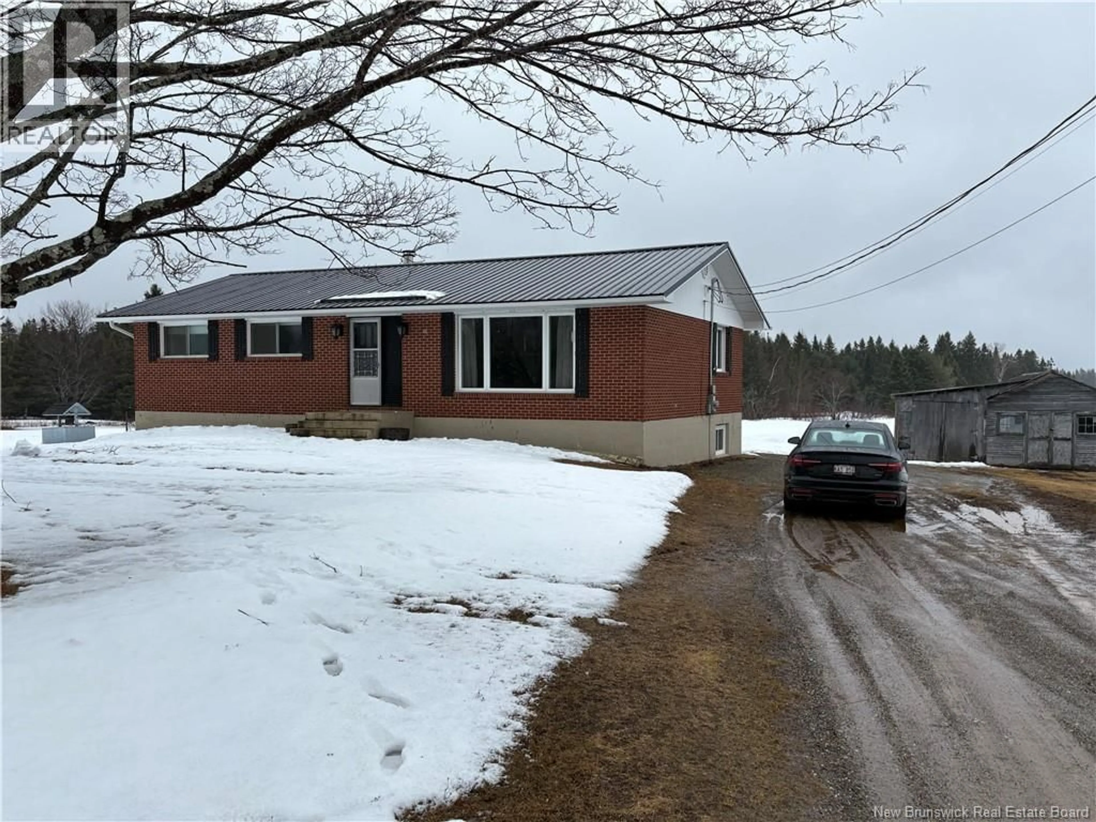 A pic from outside/outdoor area/front of a property/back of a property/a pic from drone, street for 3767 ROUTE 180, South Tetagouche New Brunswick E2A7E1