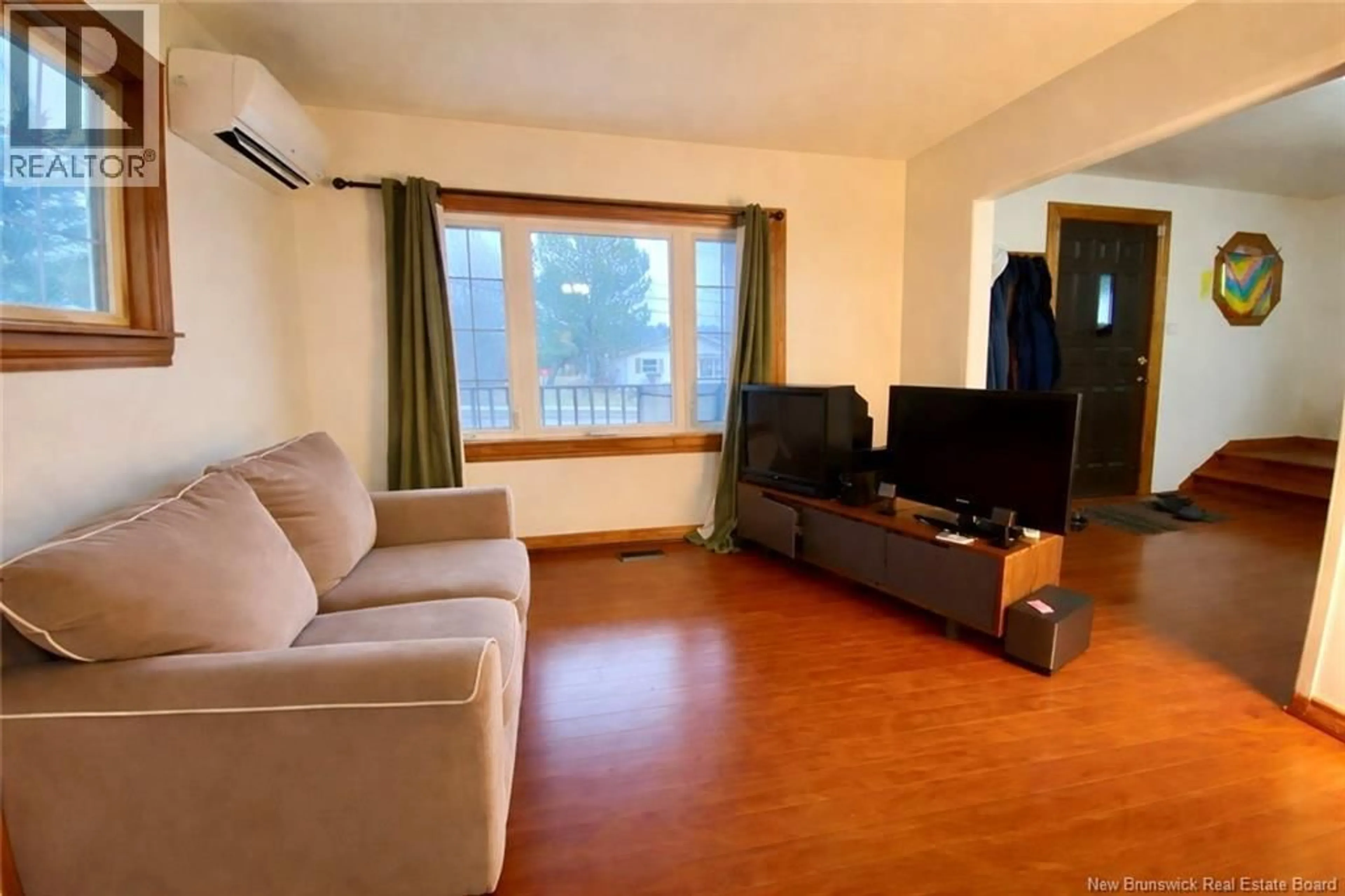 Living room with furniture, wood/laminate floor for 25 LORETTE, Dieppe New Brunswick E1A2E8