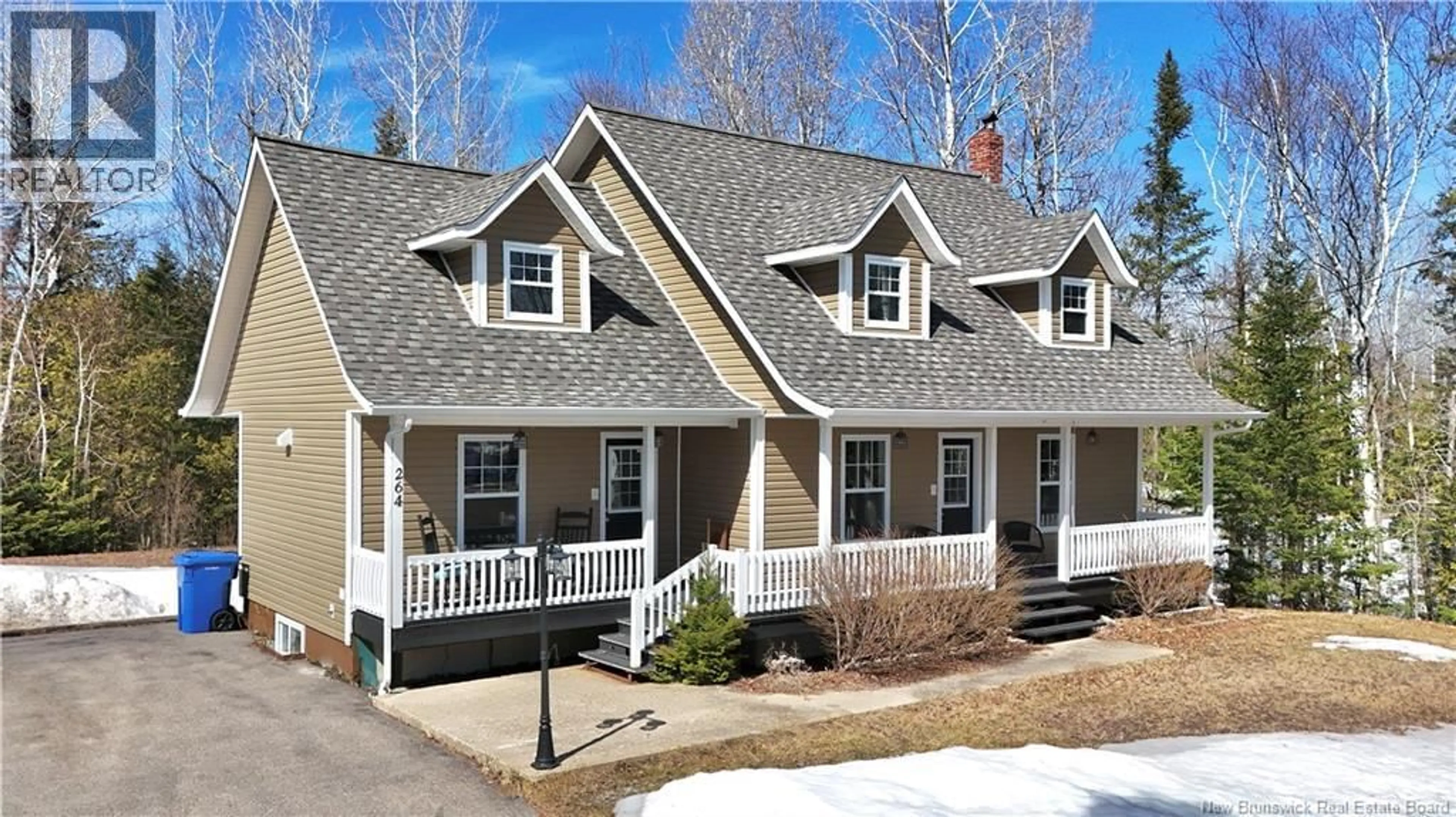 Home with vinyl exterior material, street for 264 KENT LODGE, Beresford New Brunswick E8K1B8