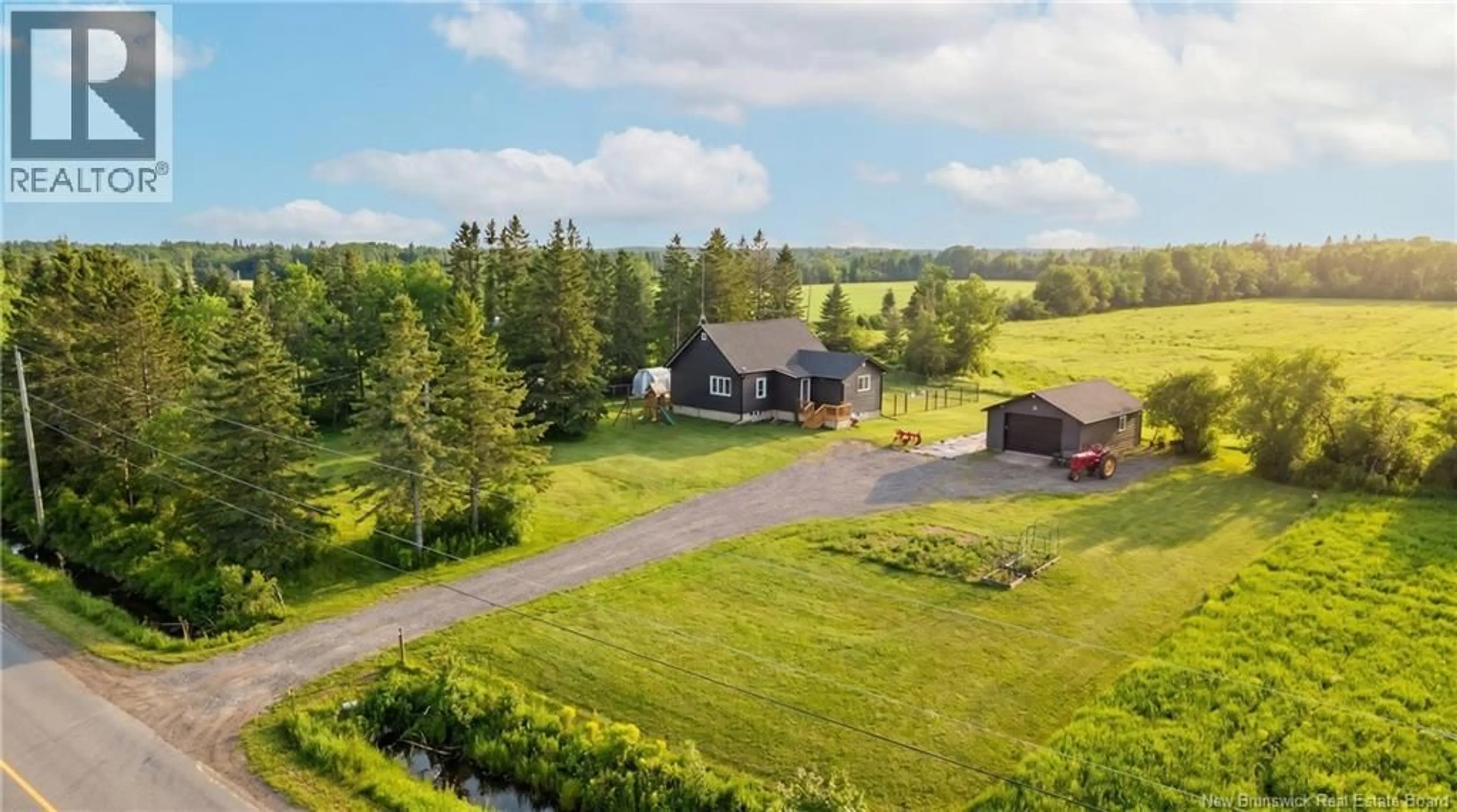 A pic from outside/outdoor area/front of a property/back of a property/a pic from drone, water/lake/river/ocean view for 3439 RTE 490, Dundas New Brunswick E1G3R7