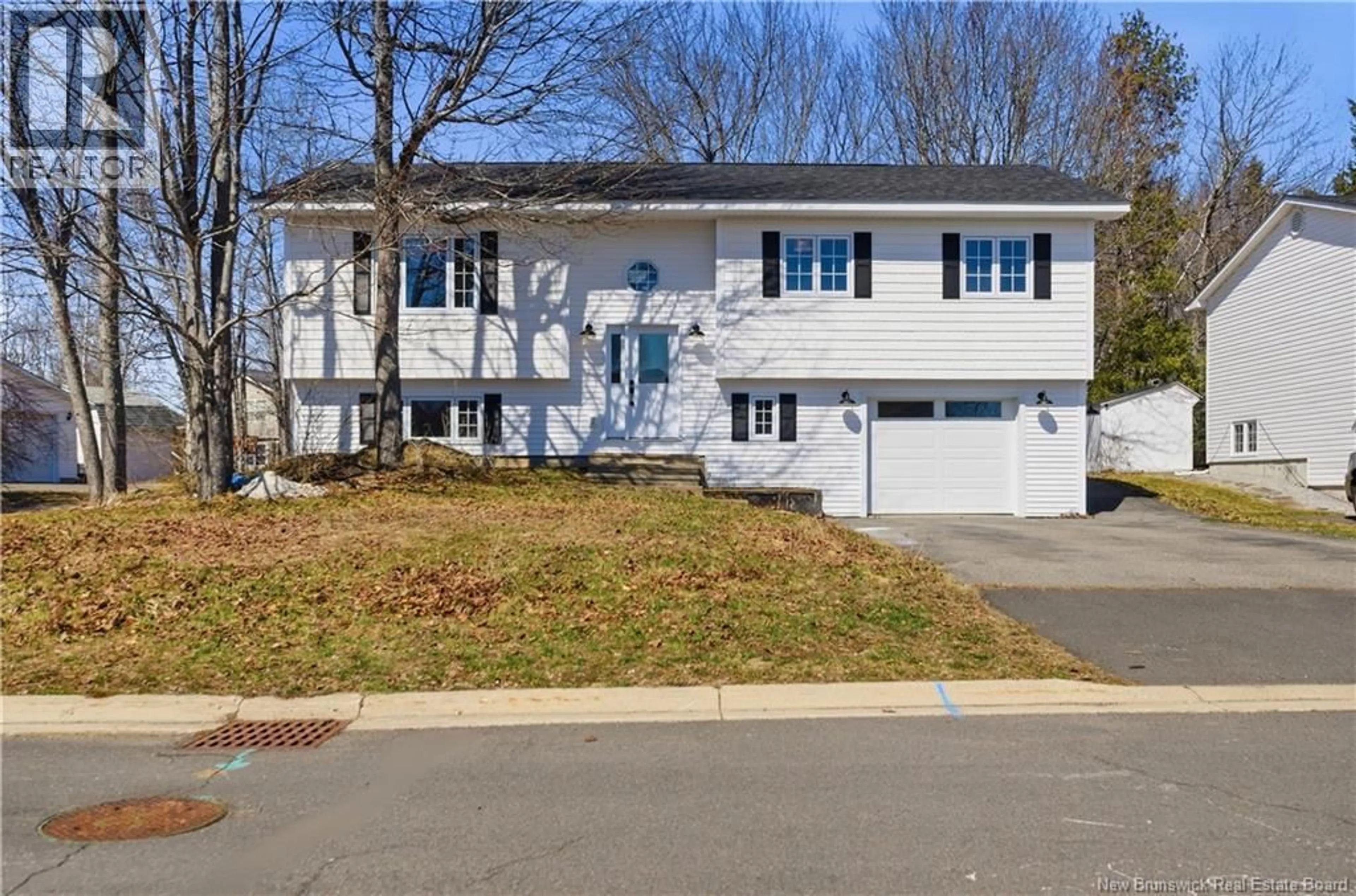 Home with vinyl exterior material, street for 21 MERRETT DRIVE, Oromocto New Brunswick E2V2L8